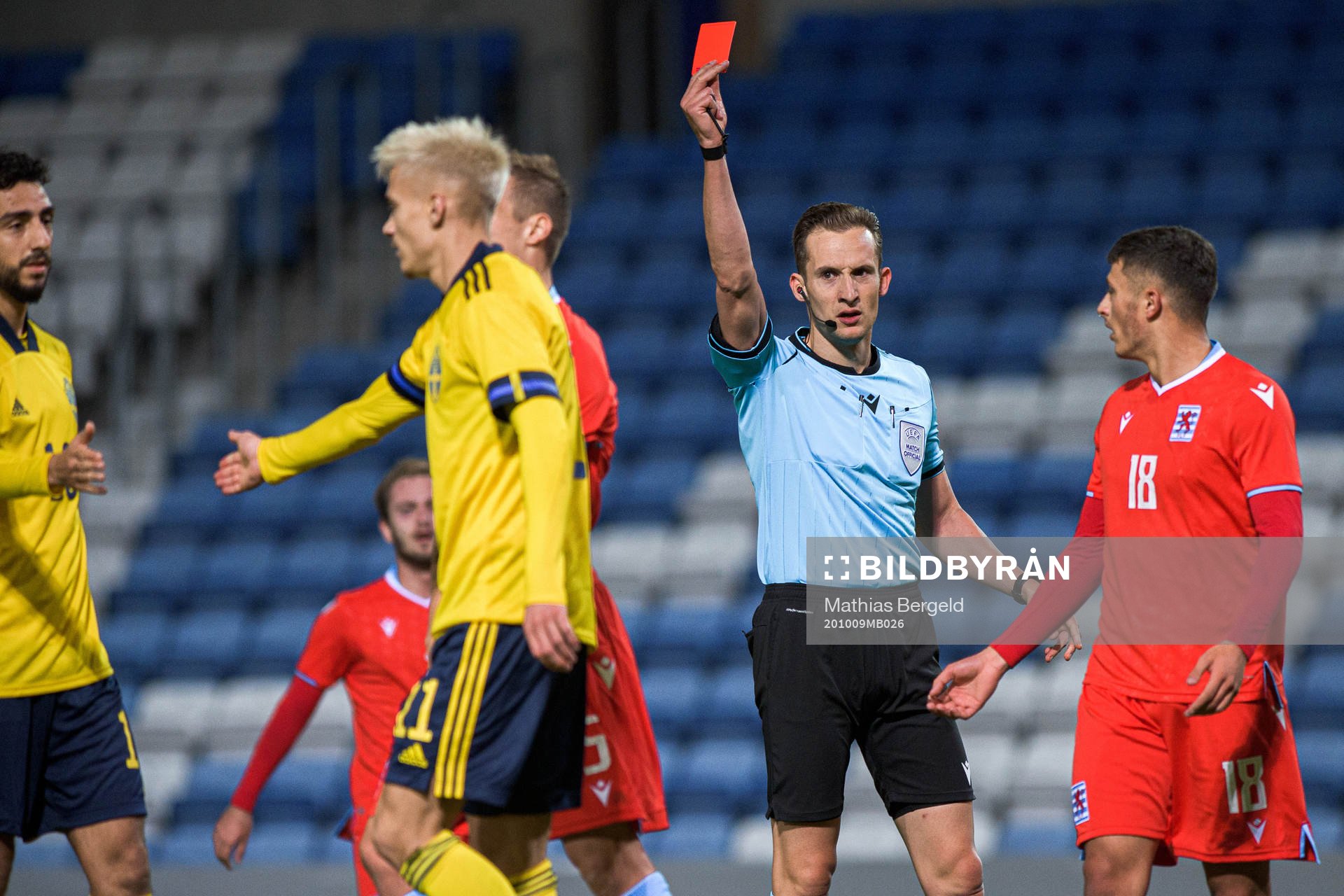Yannis Dublin of Luxembourg receives a red card from