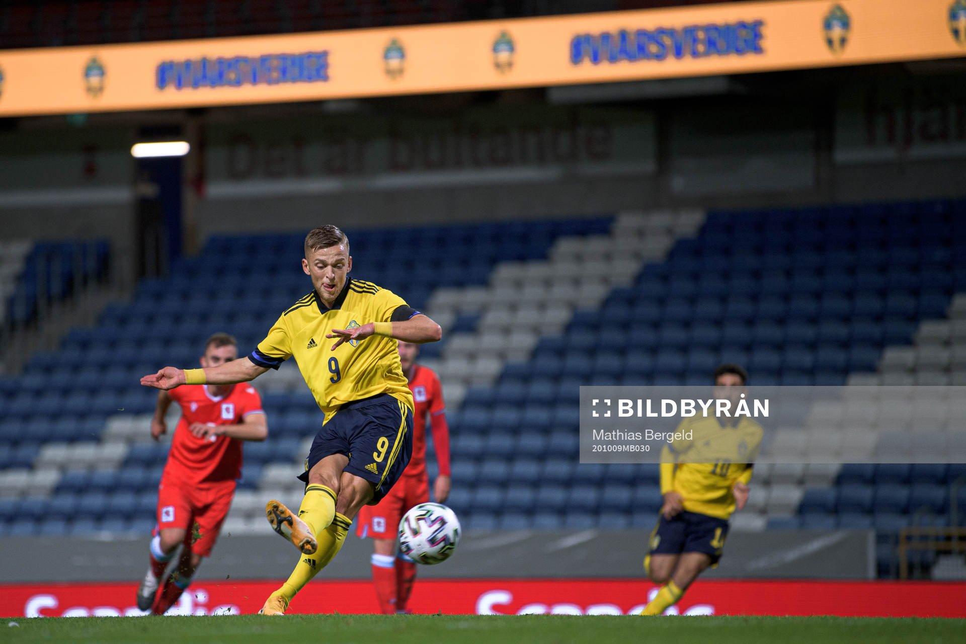 Jesper Karlsson of Sweden scores the 1-0 goal