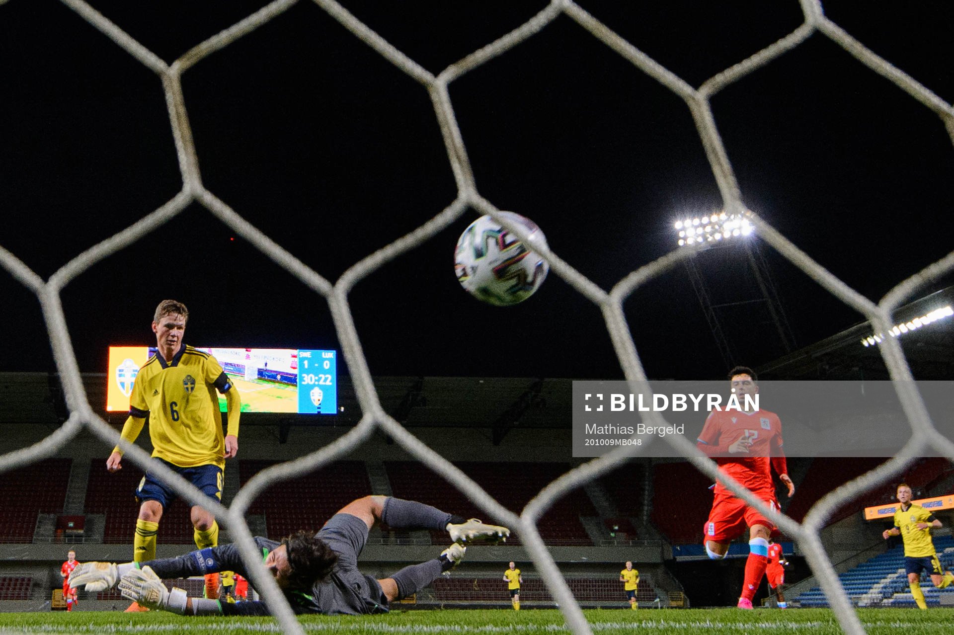 Max Svensson of Sweden scores the 2-0 goal behind