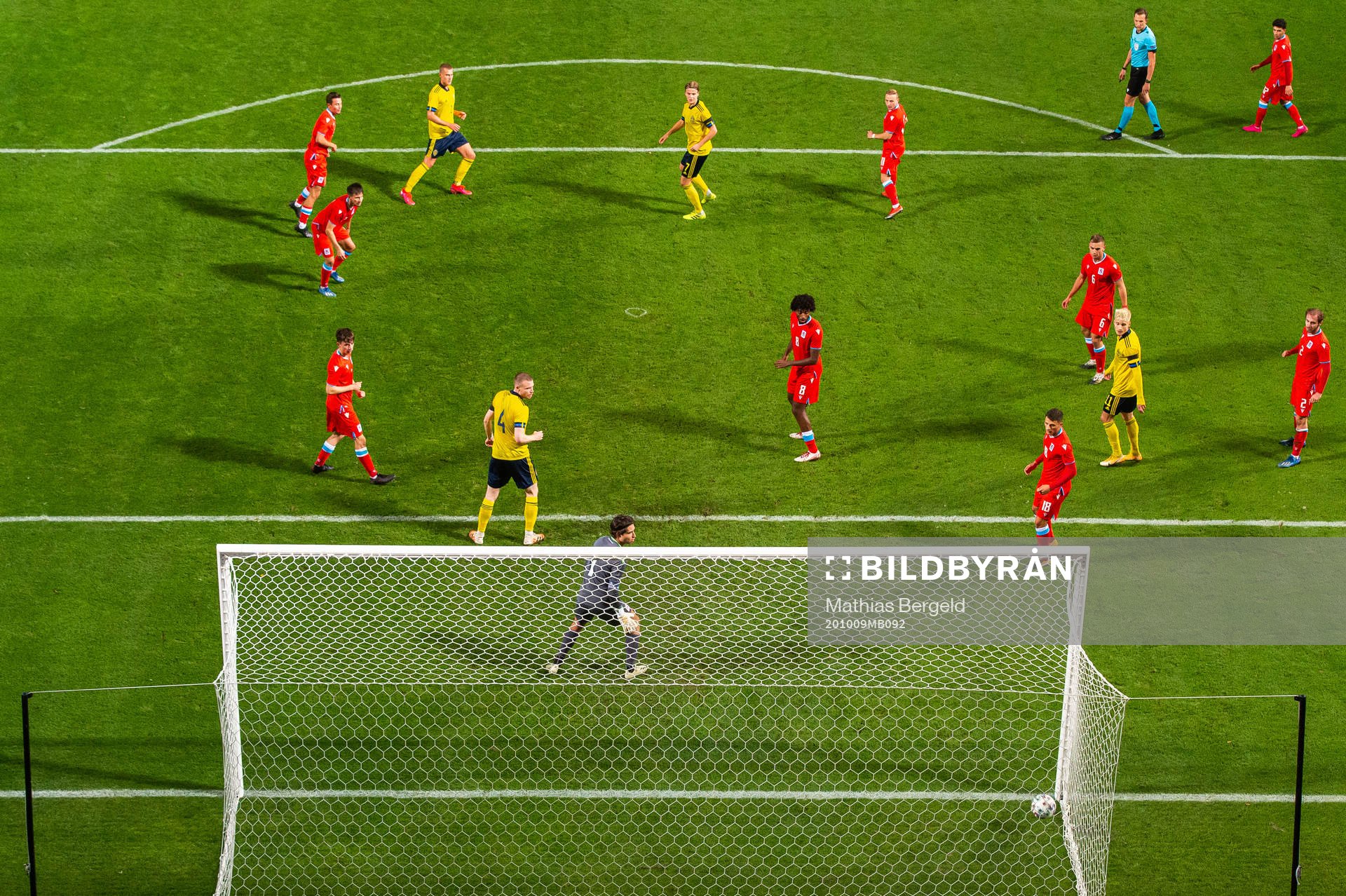 Felix Beijmo of Sweden scores 4-0 behind goalkeeper Tom