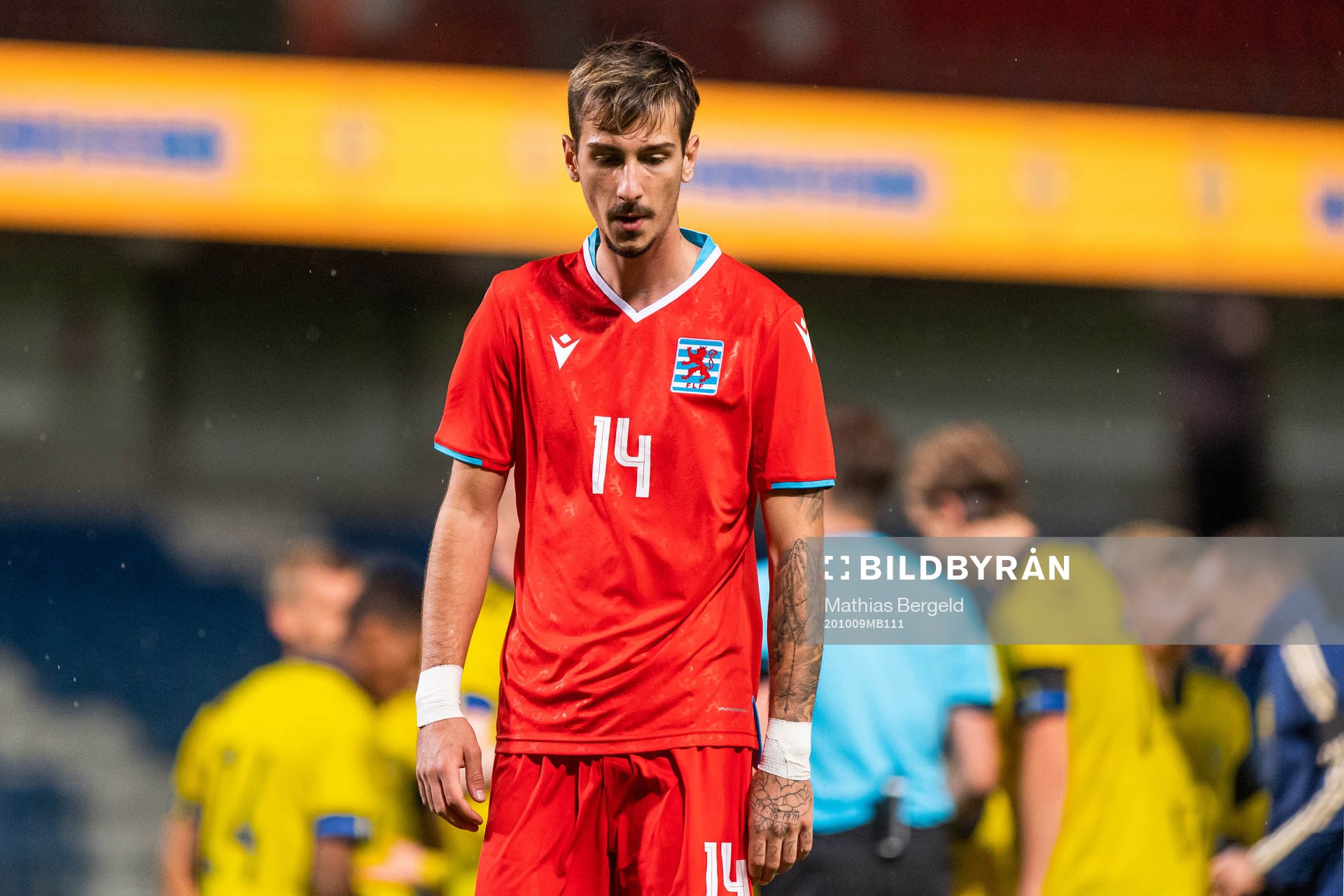 Loris Tinelli of Luxembourg looks dejected