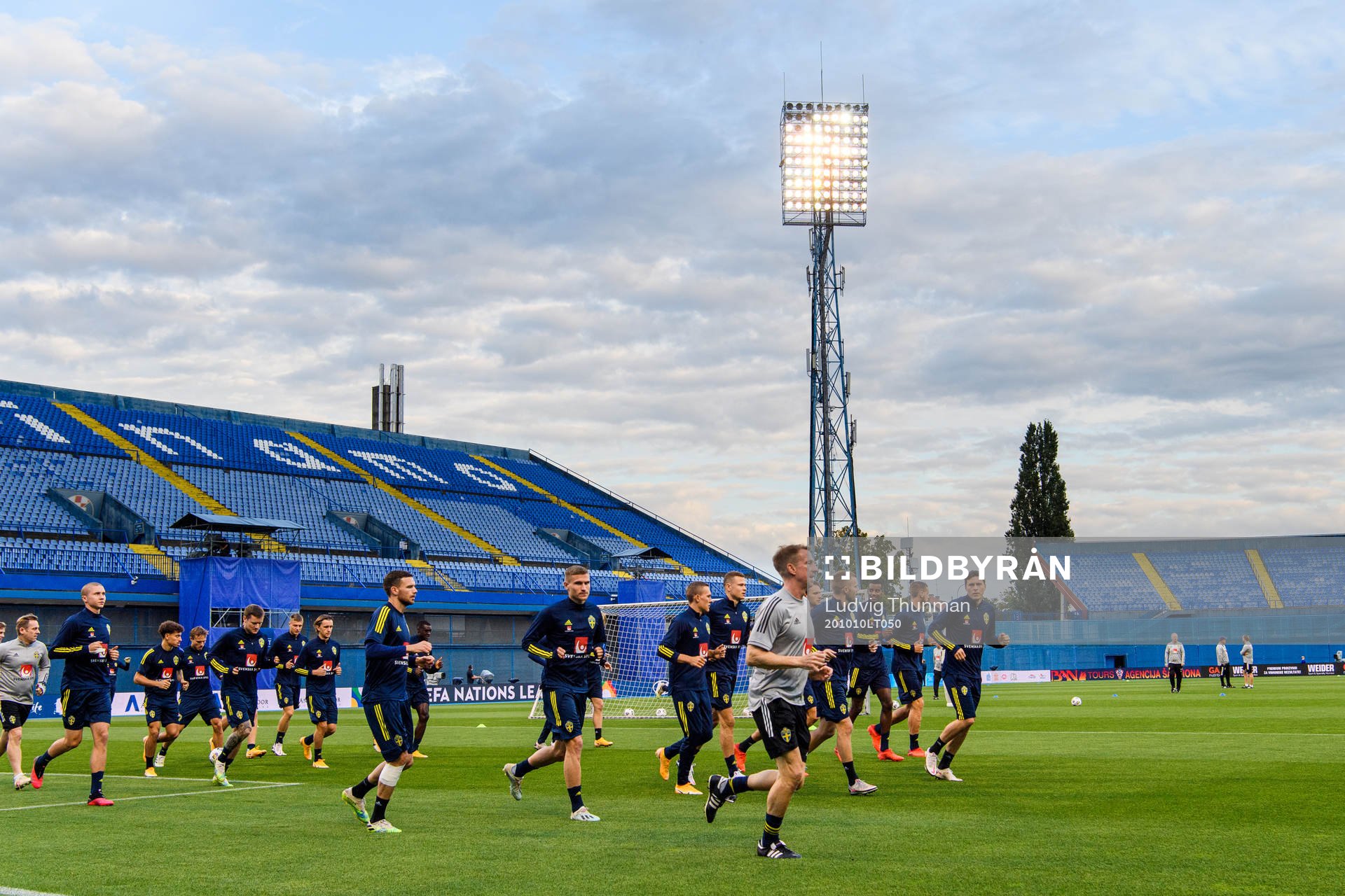 Players of the Swedish national football team warm up