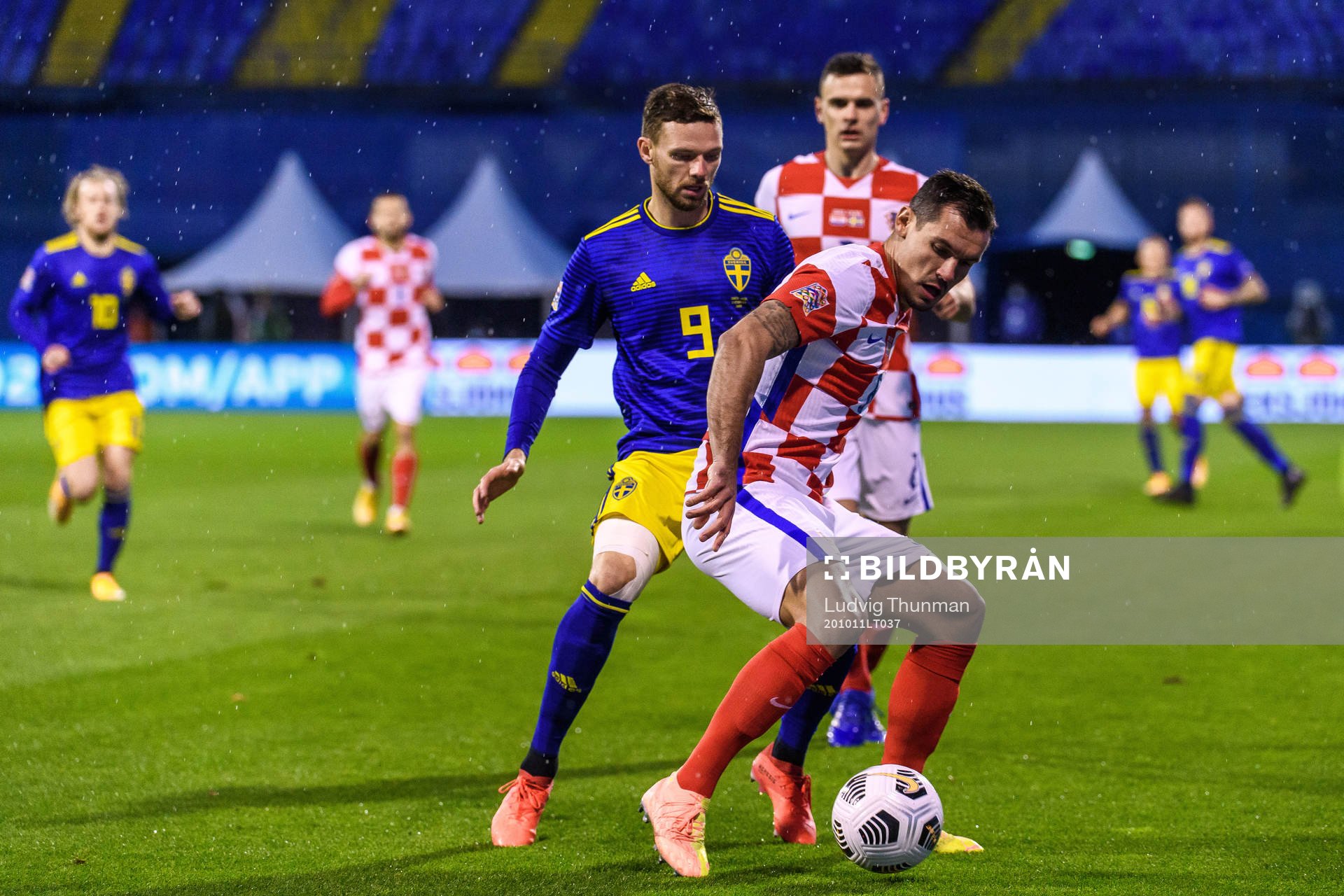 Marcus Berg of Sweden and Dejan Lovren of Croatia