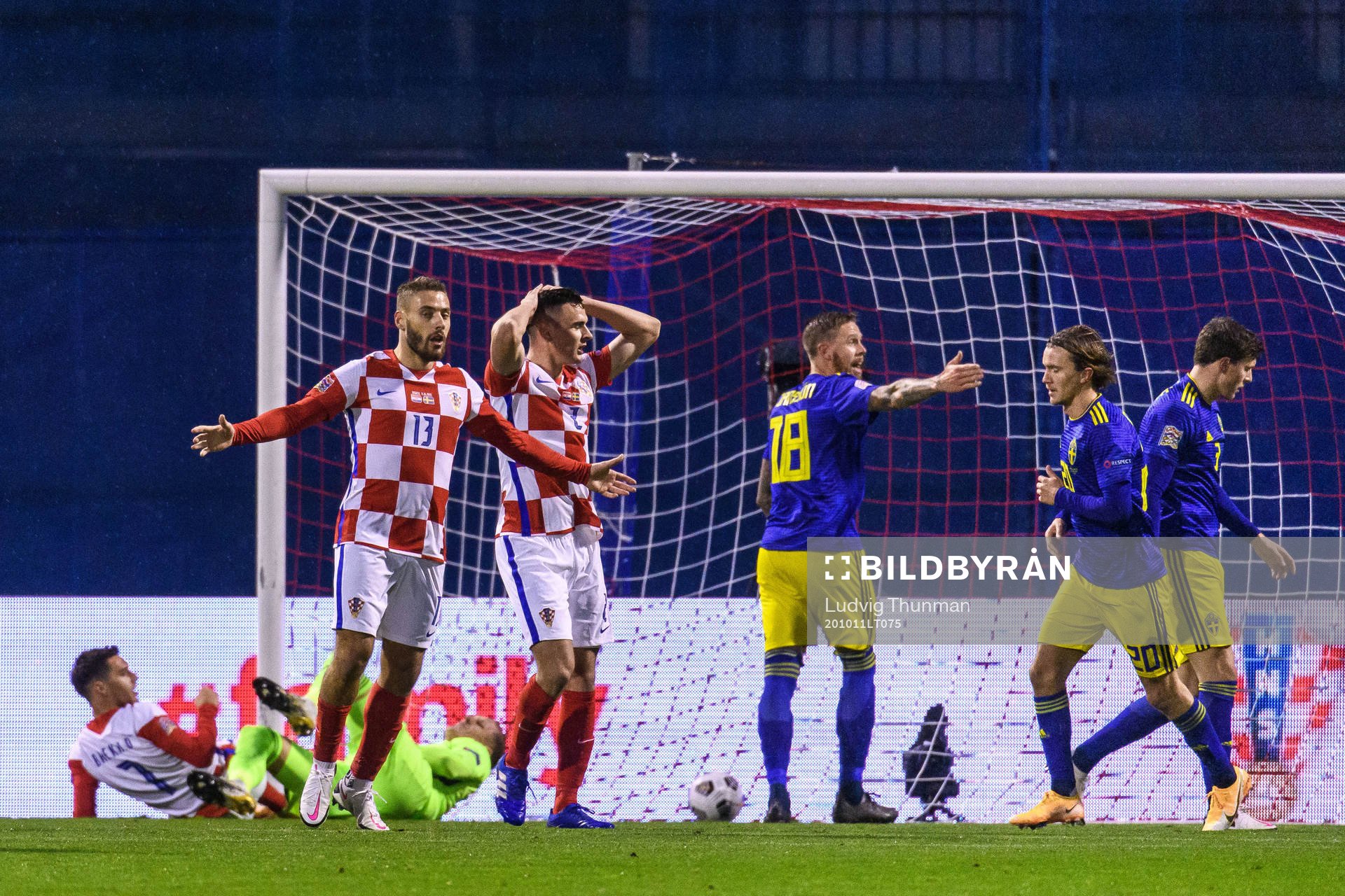 Nikola Vlasic and Filip Uremovic of Croatia looks dejected