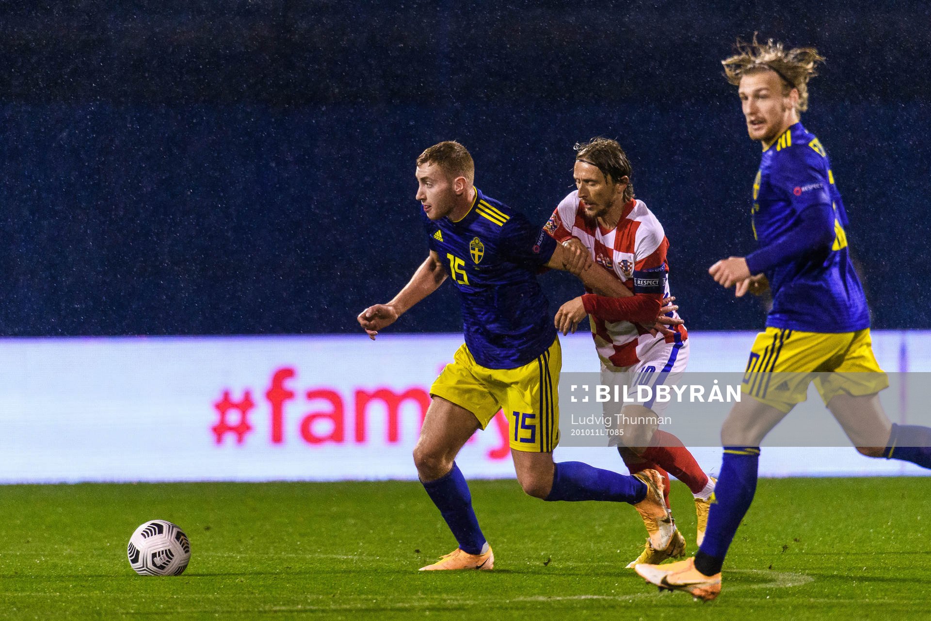 Dejan Kulusevski of Sweden and Luka Modric of Croatia