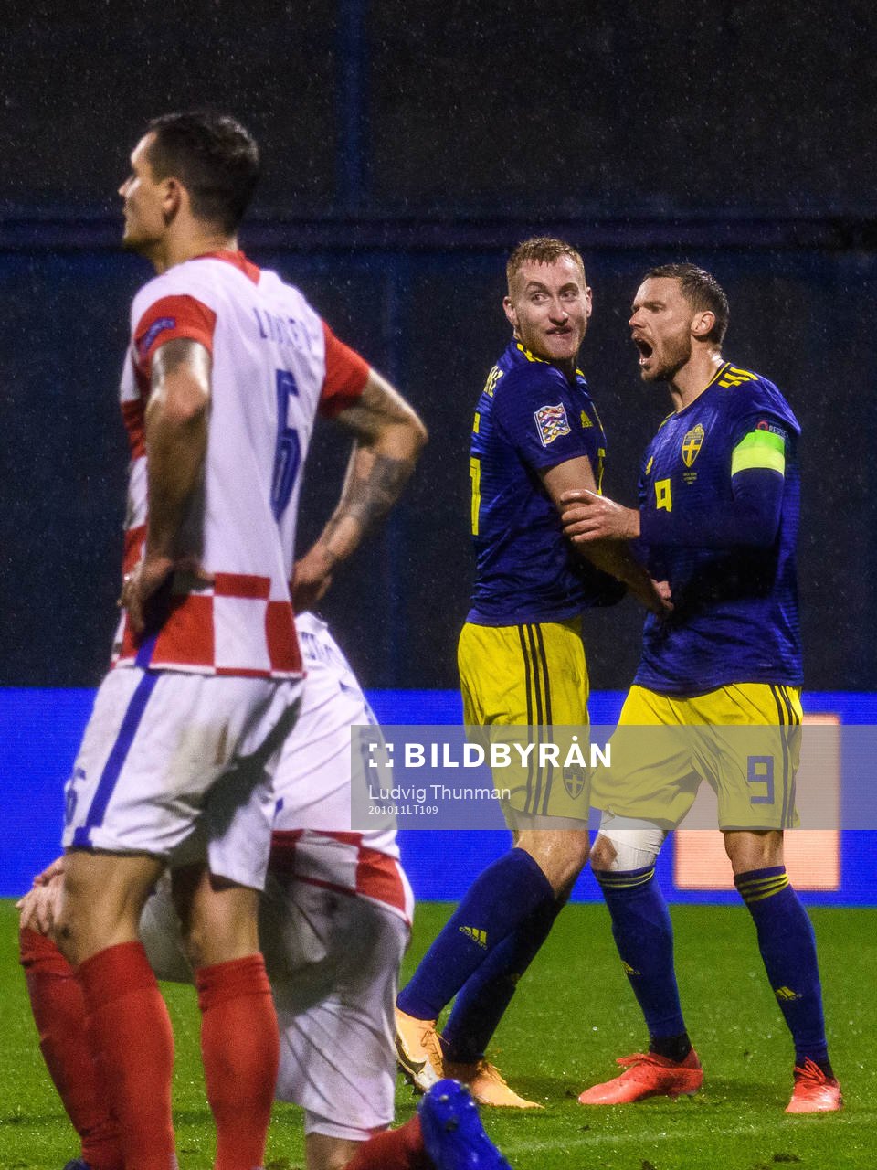 Dejan Kulusevski and Marcus Berg of Sweden celebrate