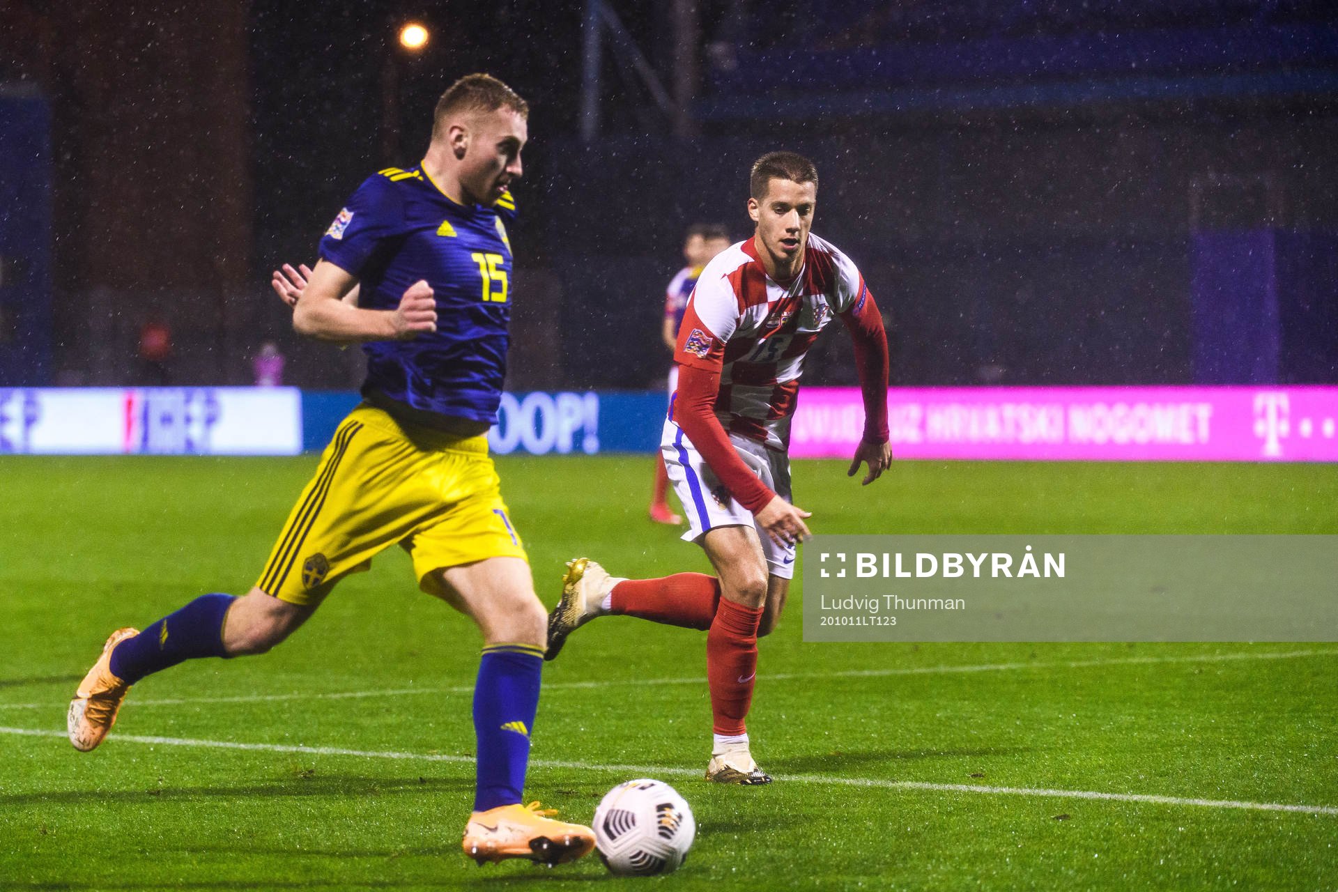 Dejan Kulusevski of Sweden and Mario Pasalic of Croatia
