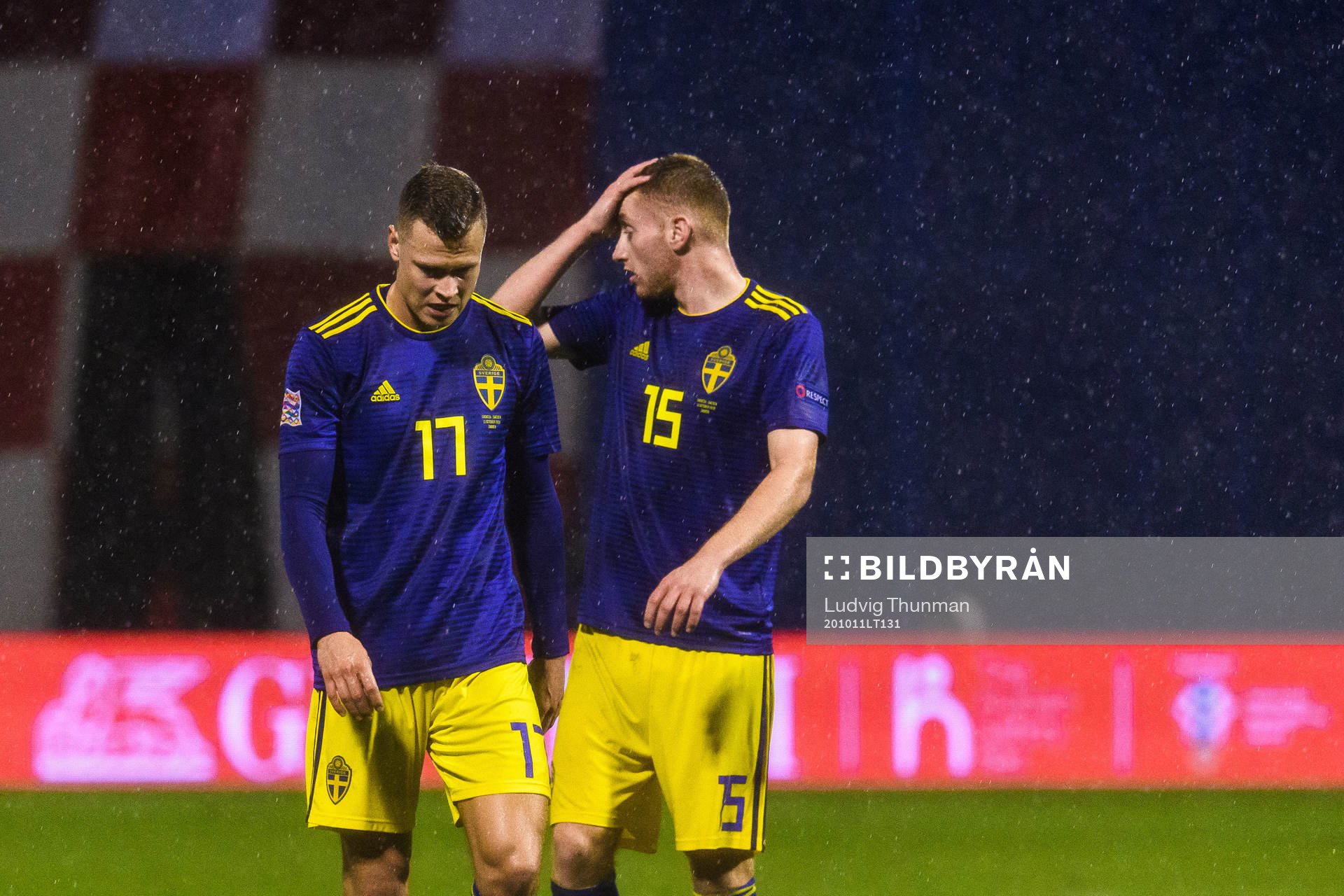 Viktor Claesson and Dejan Kulusevski of Sweden look dejected