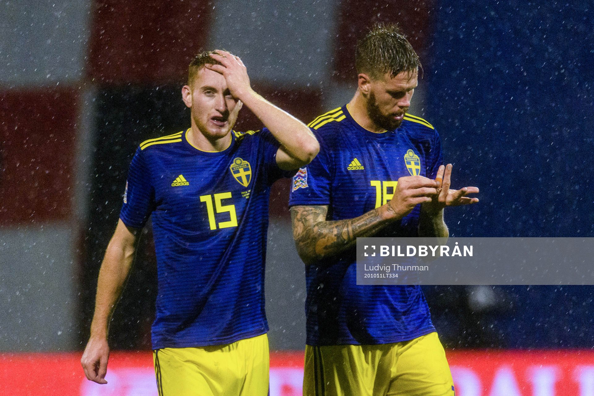 Dejan Kulusevski and Pontus Jansson of Sweden looks dejected