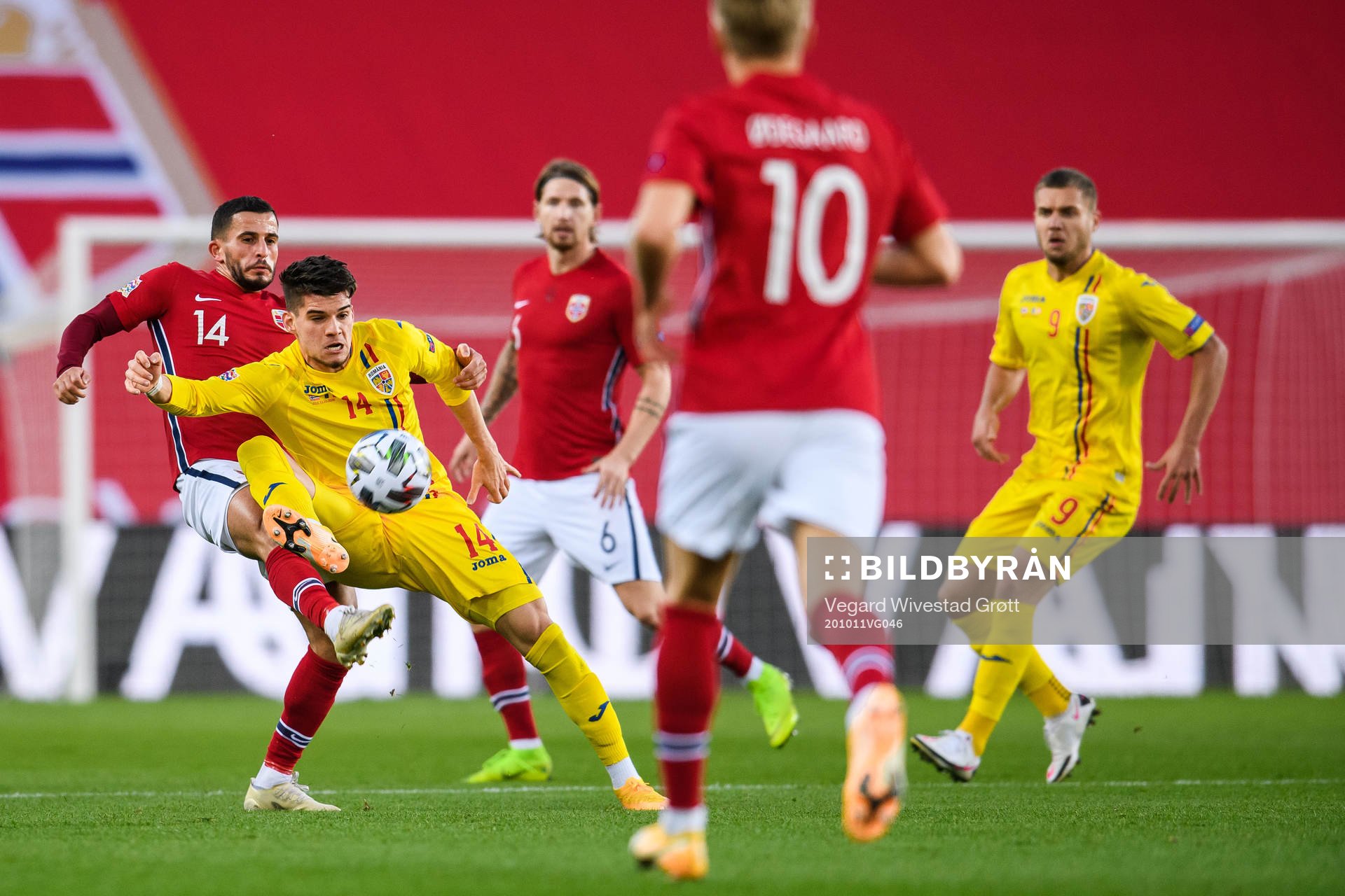 Omar Elabdellaoui of Norway and Ianis Hagi of Romania