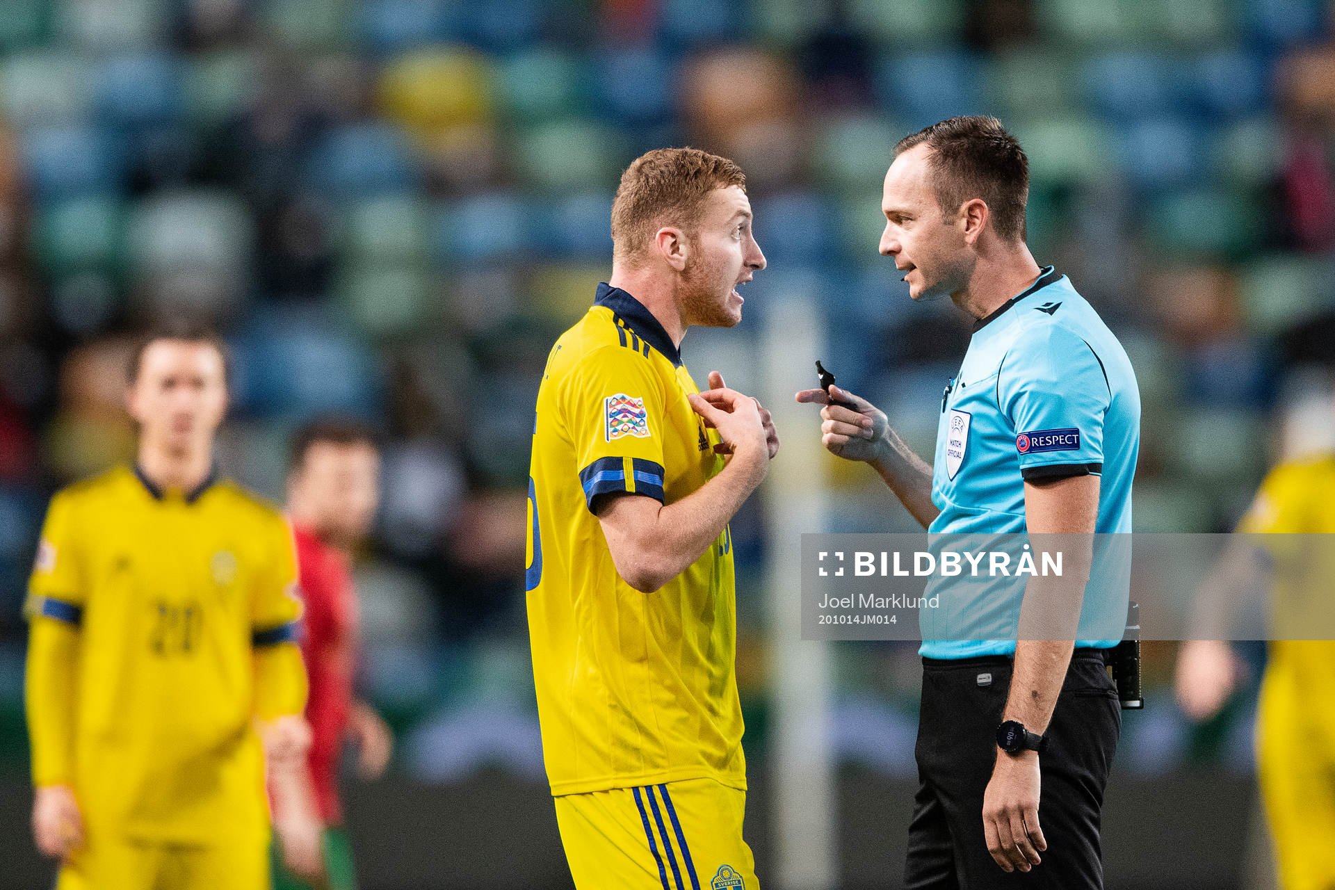 Dejan Kulusevski of Sweden and referee Luis Medina Cantalejo
