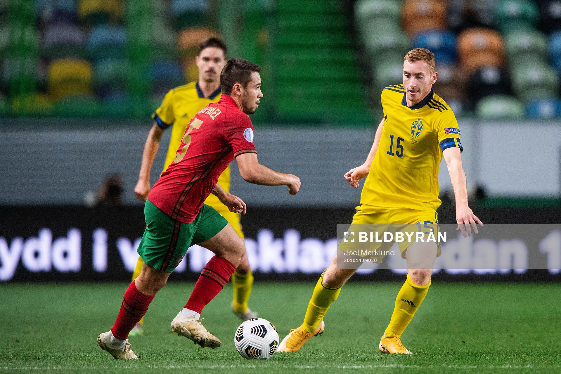 Raphael Guerreiro of Portugal and Dejan Kulusevski of Sweden