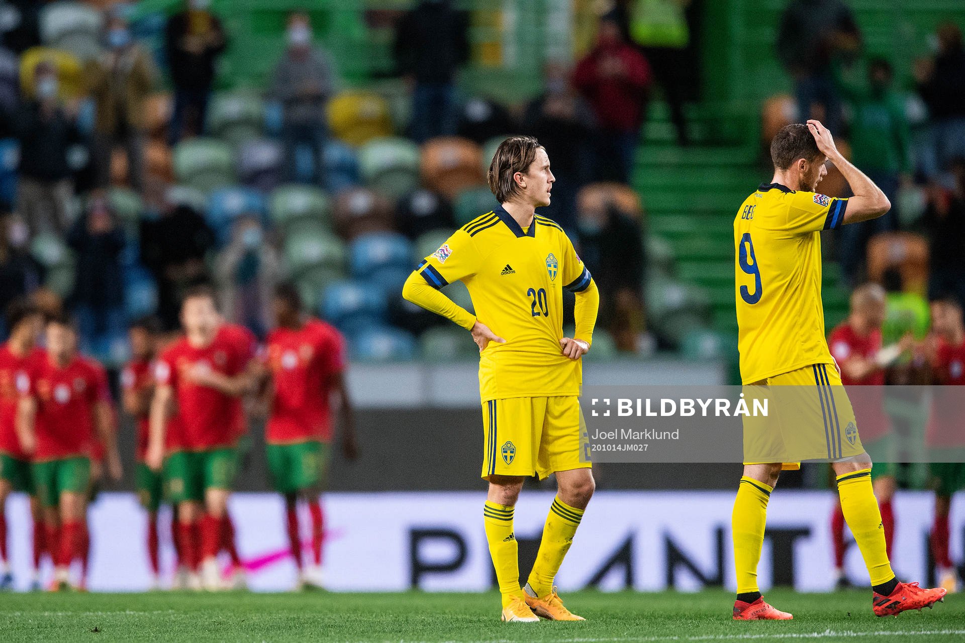 Kristoffer Olsson and Marcus Berg of Sweden looks dejected
