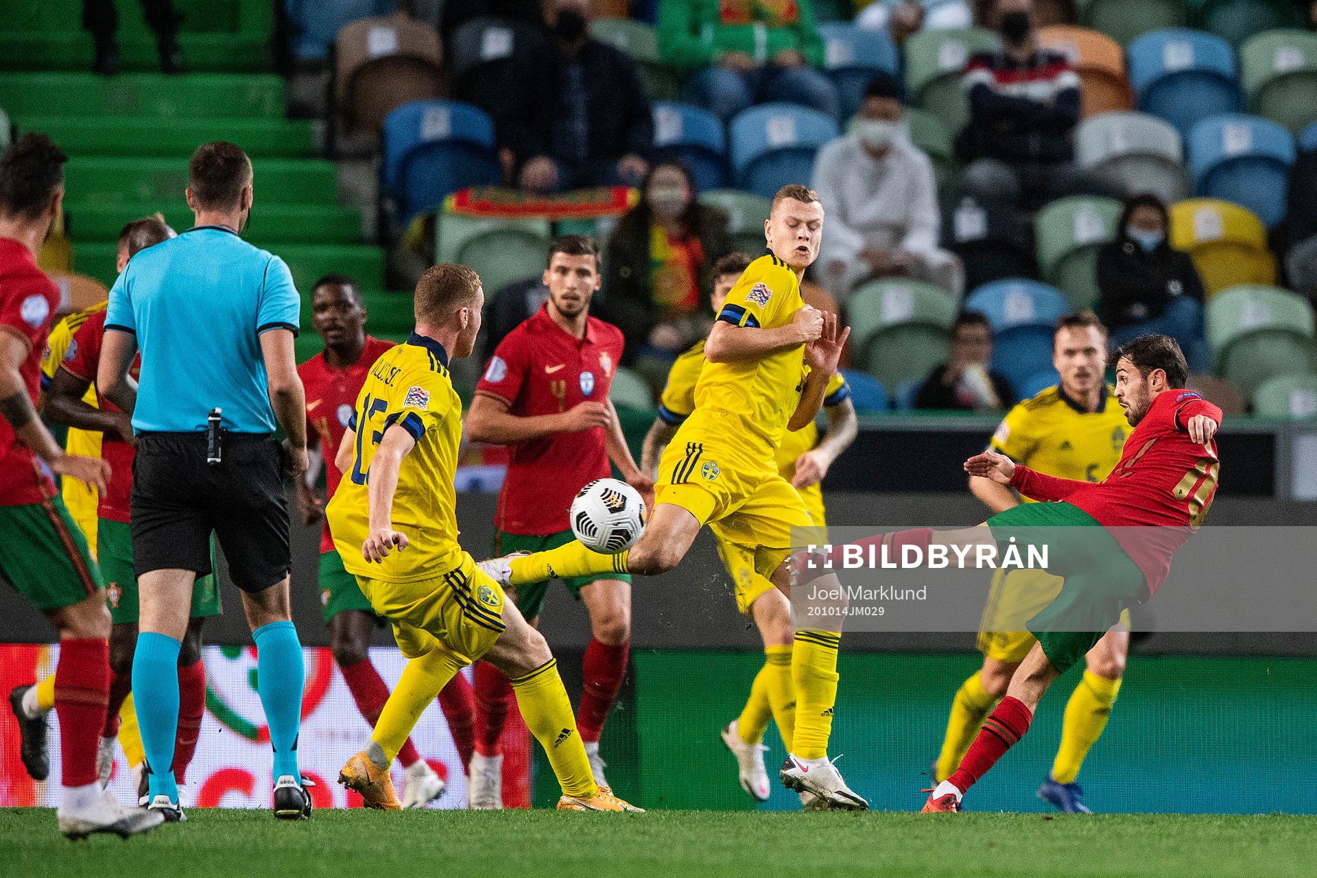 Bernardo Silva of Portugal and Viktor Claesson of Sweden