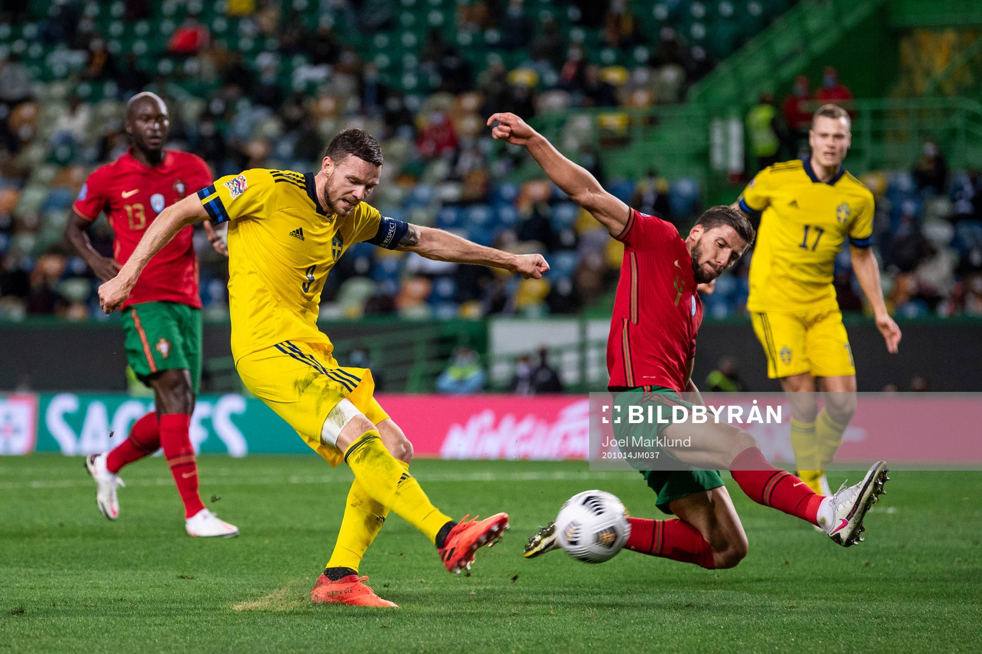 Marcus Berg of Sweden and Ruben Dias of Portugal