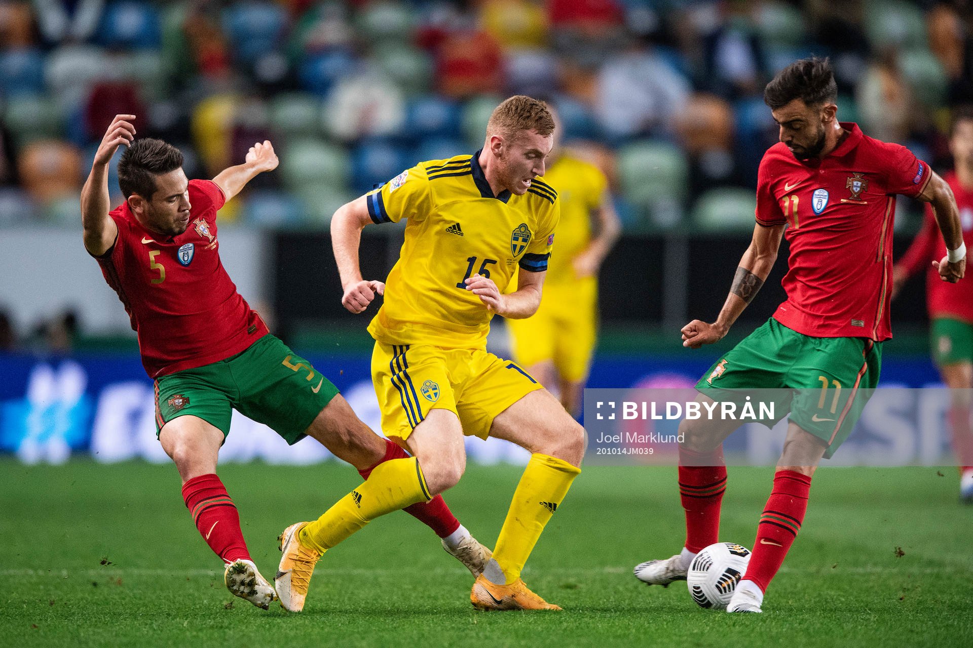 Raphael Guerreiro and Bruno Fernandes of Portugal against