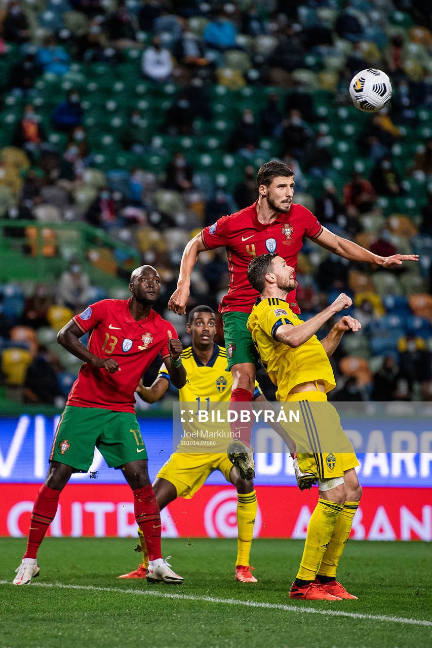 Danilo and Ruben Dias of Portugal against Alexander Isak