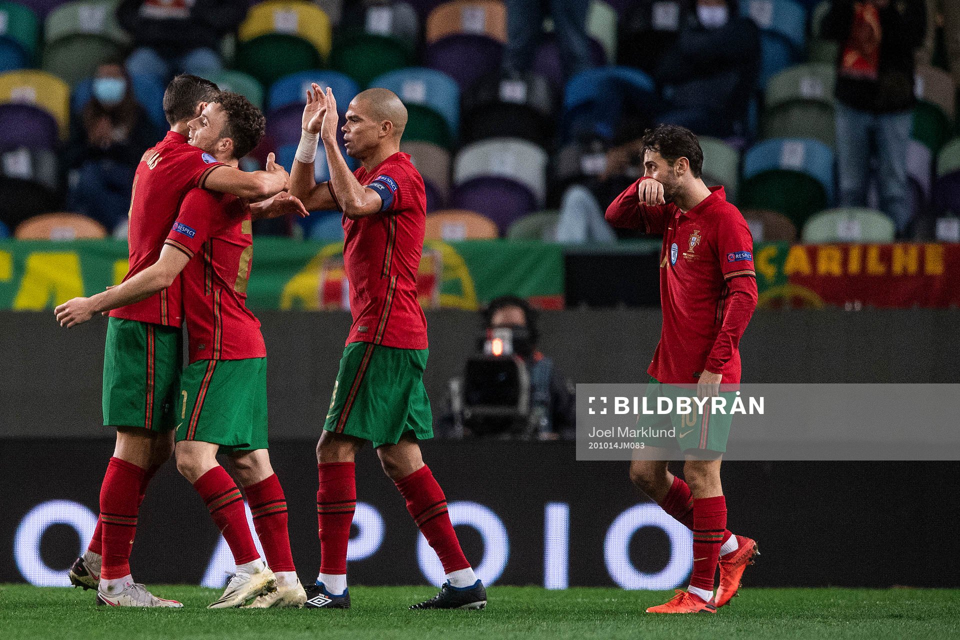 Ruben Dias, Diogo Jota and Pepe of Portugal celebrate