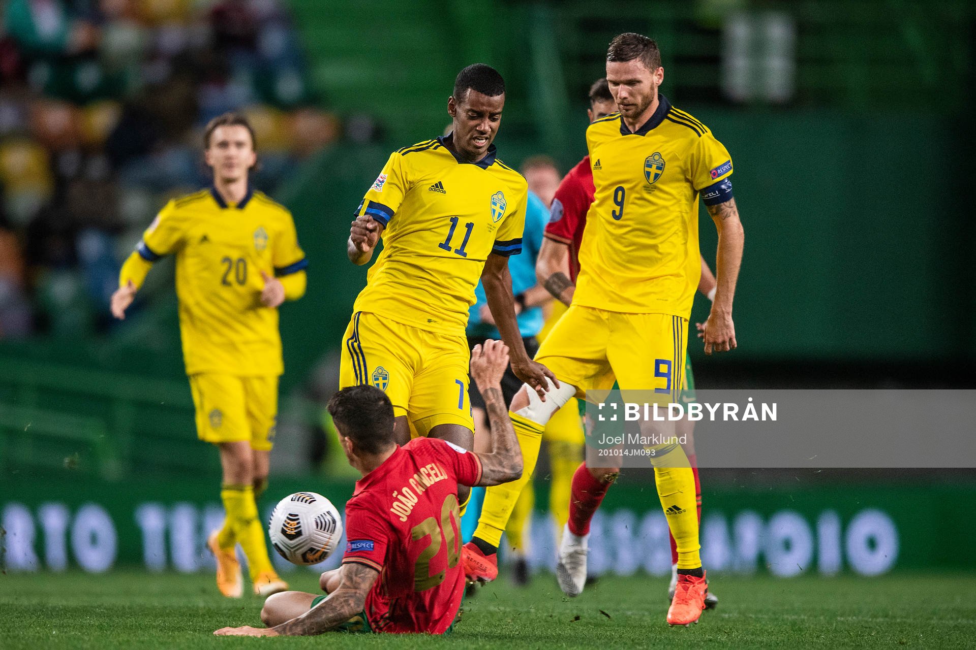 Joao Cancelo of Portugal against Alexander Isak