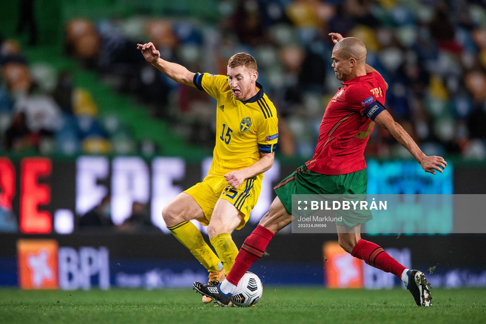 Dejan Kulusevski of Sweden and Pepe of Portugal