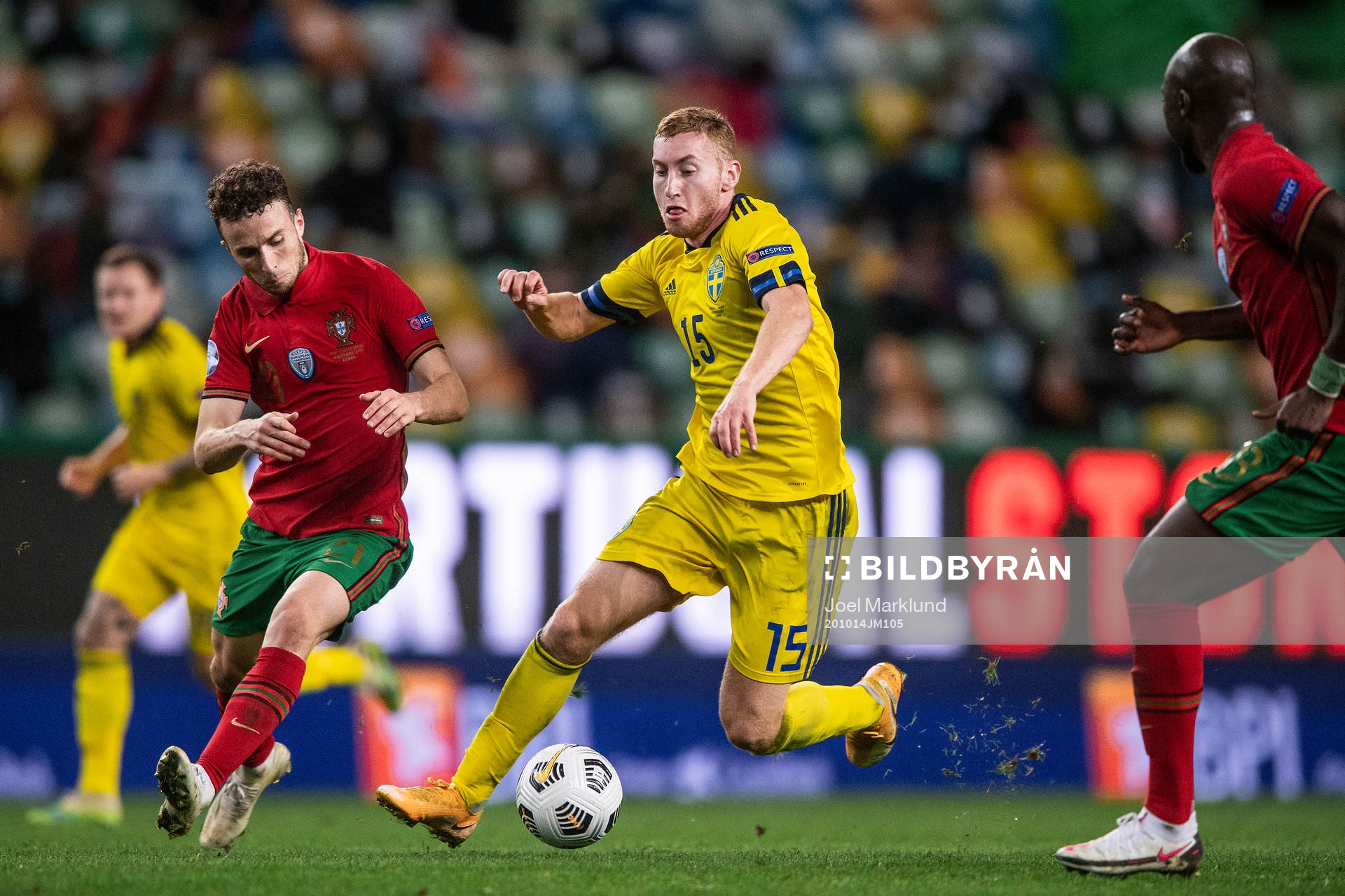 Diogo Jota of Portugal and Dejan Kulusevski of Sweden