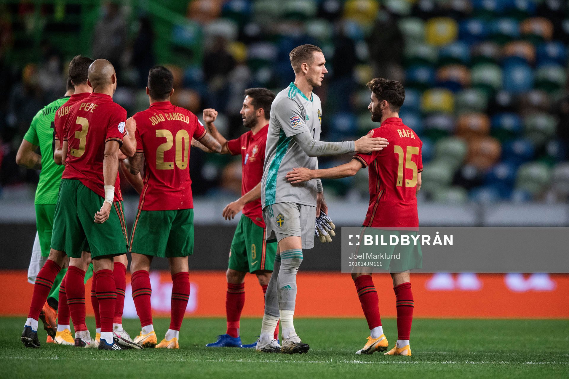 goalkeeper Robin Olsen of Sweden and Rafa Silva of Portugal
