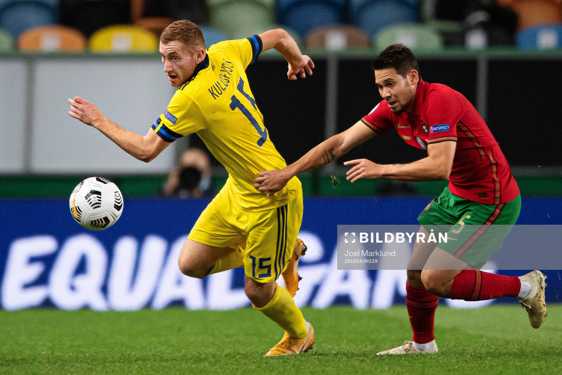 Dejan Kulusevski of Sweden and Raphael Guerreiro of Portugal