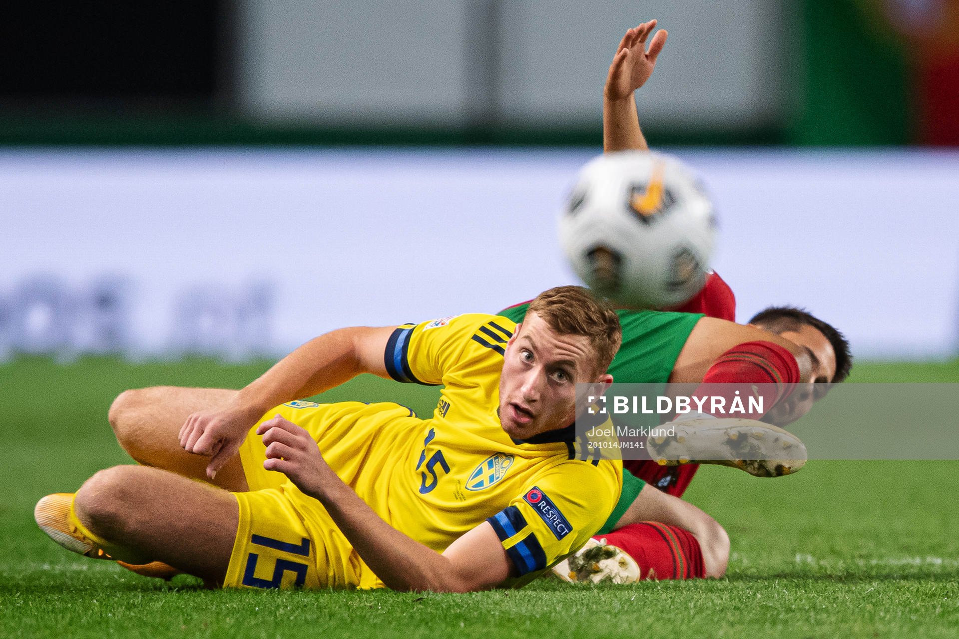 Dejan Kulusevski of Sweden and Raphael Guerreiro of Portugal