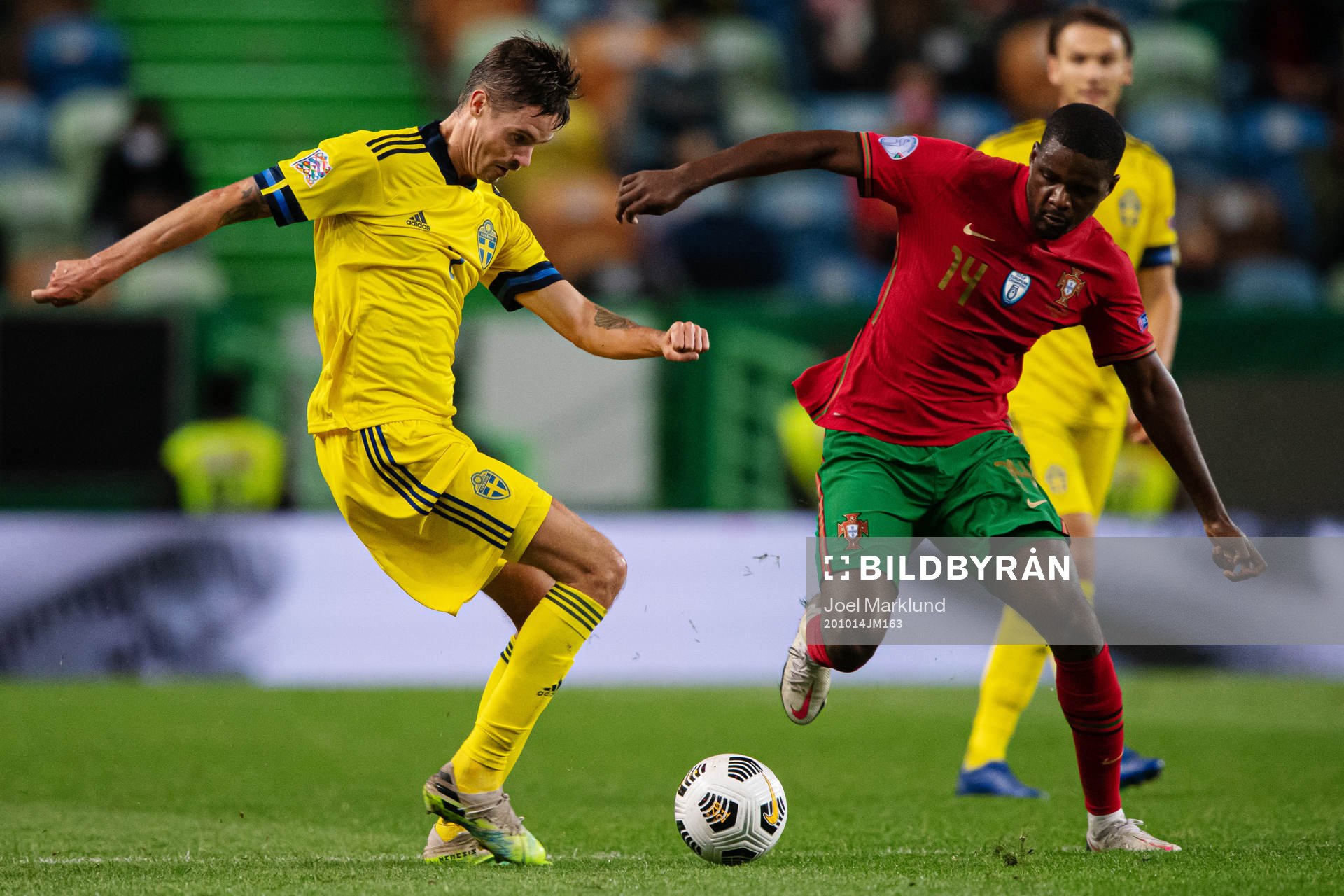 Mikael Lustig of Sweden and William Carvalho of Portugal