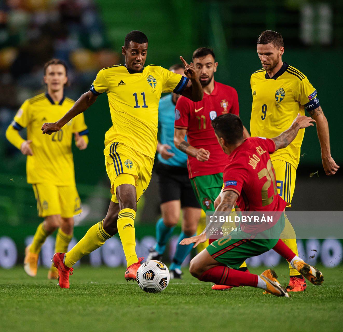 Alexander Isak and Marcus Berg of Sweden against Joao