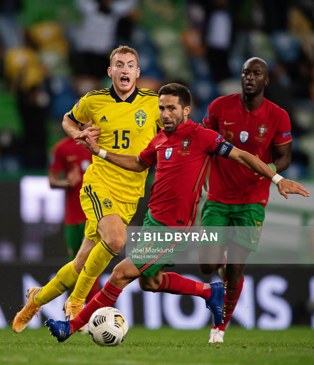 Dejan Kulusevski of Sweden in action against Joao Moutinho and Danilo of Portugal during the Nations League football match between Portugal and Sweden on October 14, 2020 in Lisbon.