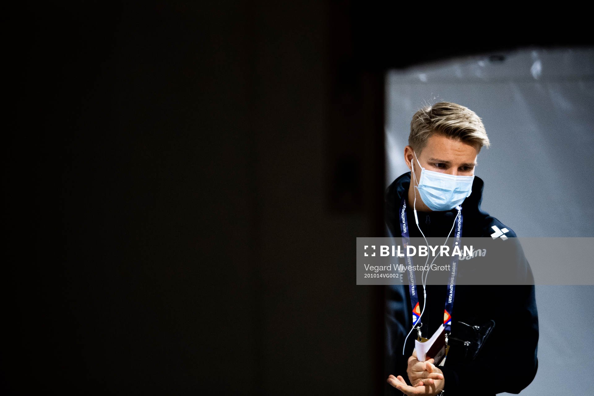 Martin Ødegaard of Norway arrives wearing a face mask