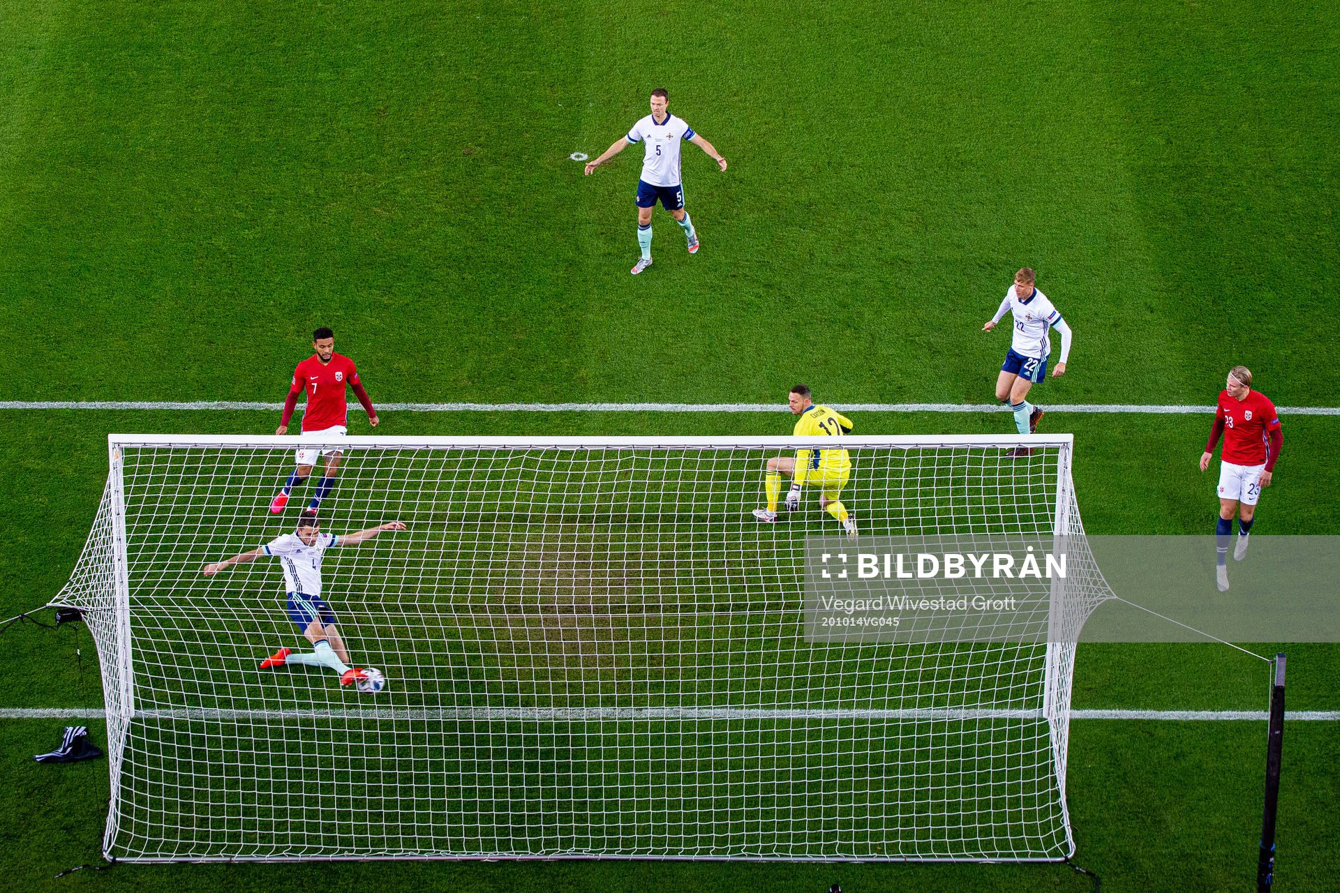 Tom Flanagan of Northern Ireland saves the attempt from