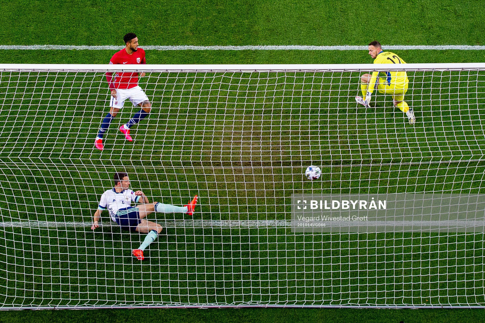 Tom Flanagan of Northern Ireland saves an attempt