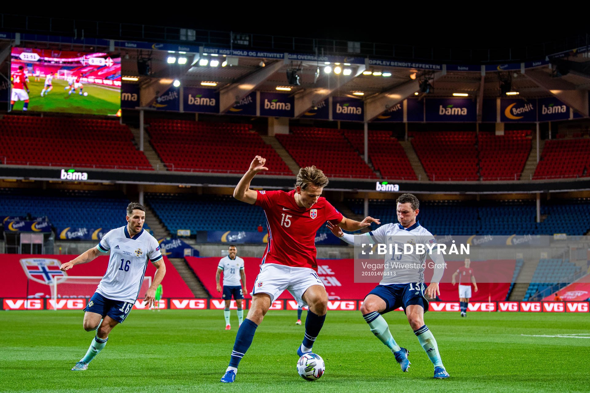 Sander Berge of Norway and Corry Evans of Northern Ireland