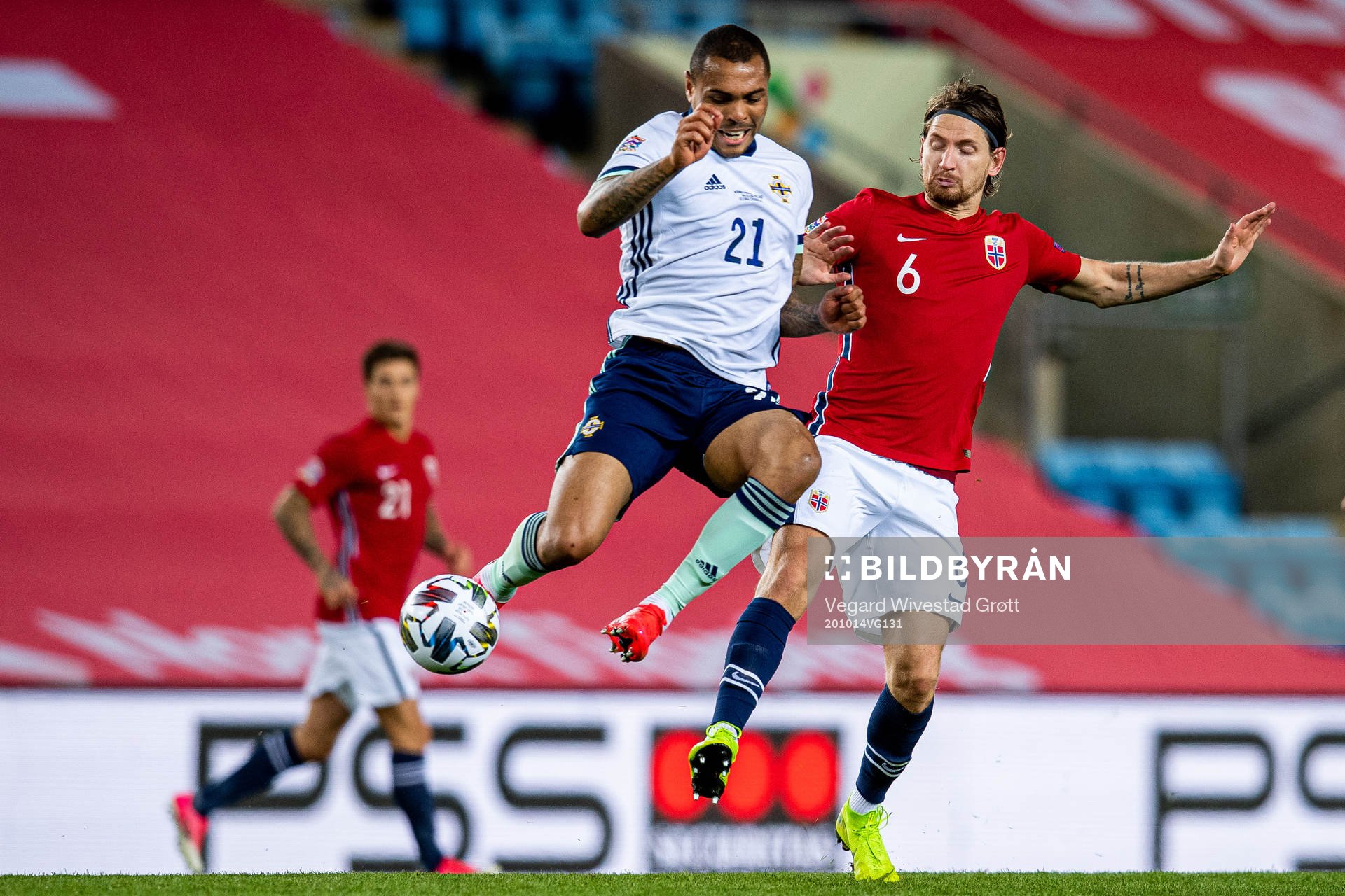 Josh Magennis of Northern Ireland and Stefan Strandberg of