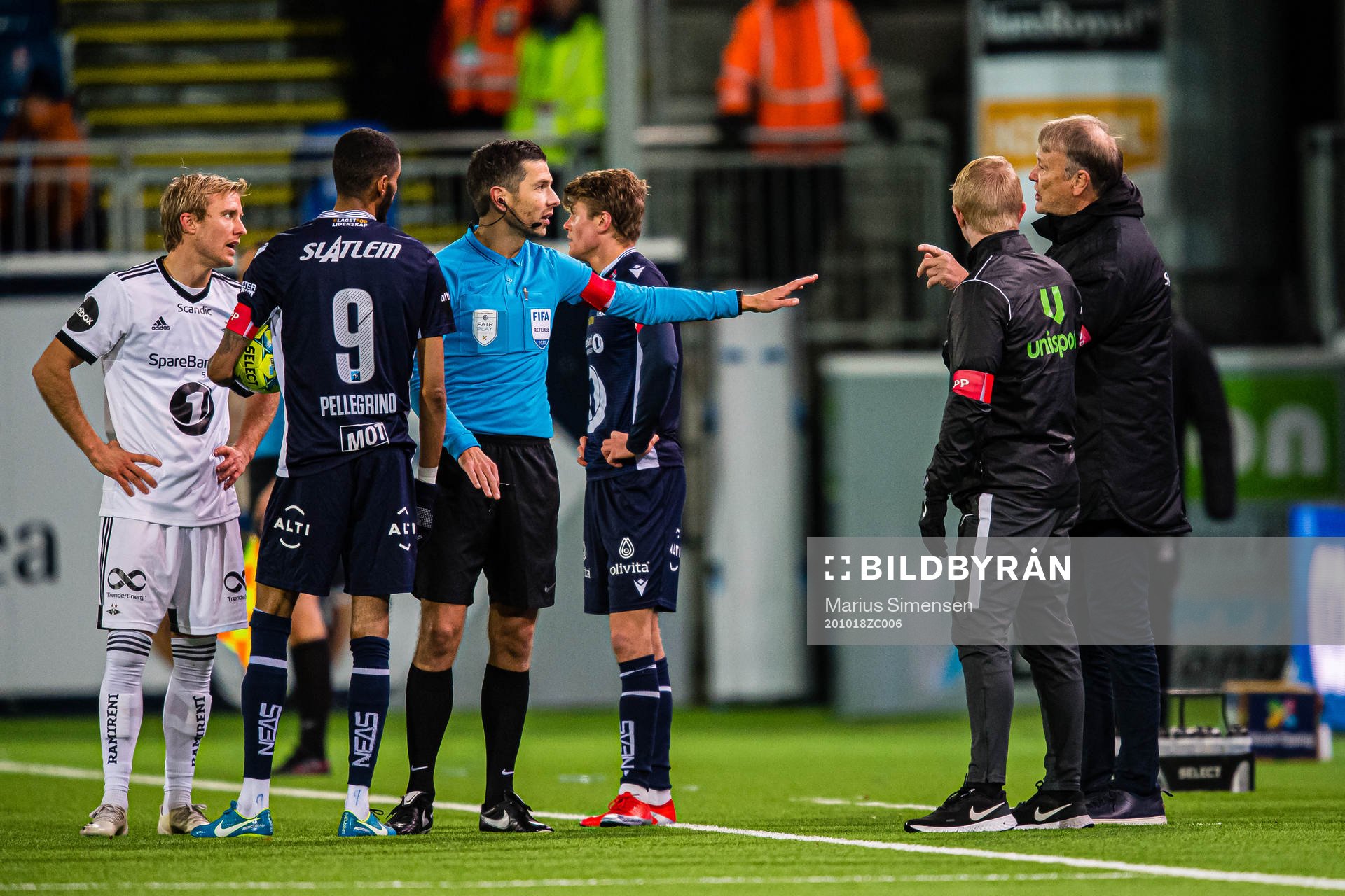Per Ciljan Skjelbred of Rosenborg, Tore Hansen, referee,