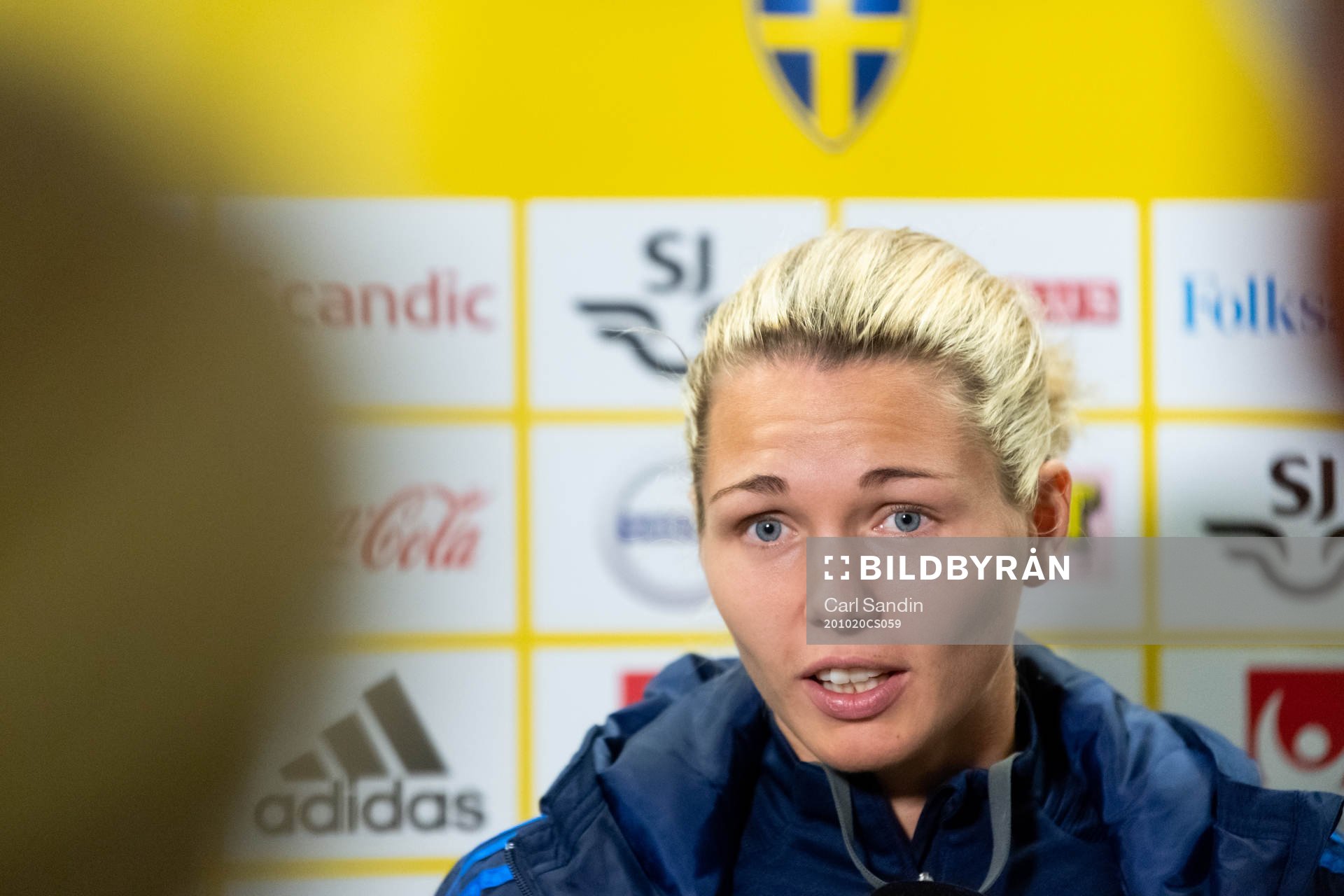 Goalkeeper Jennifer Falk is being interviewed