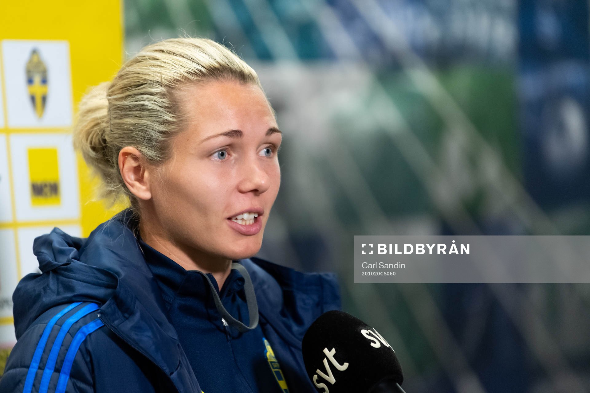 Goalkeeper Jennifer Falk is being interviewed