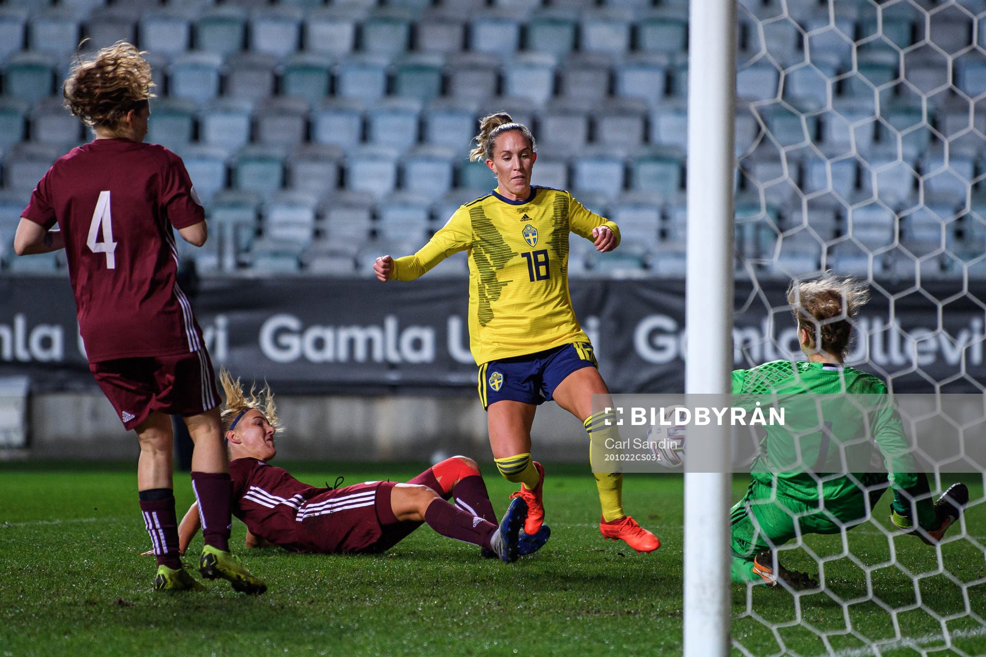 Julia Roddar of Sweden against goalkeeper Sofja Nesterova