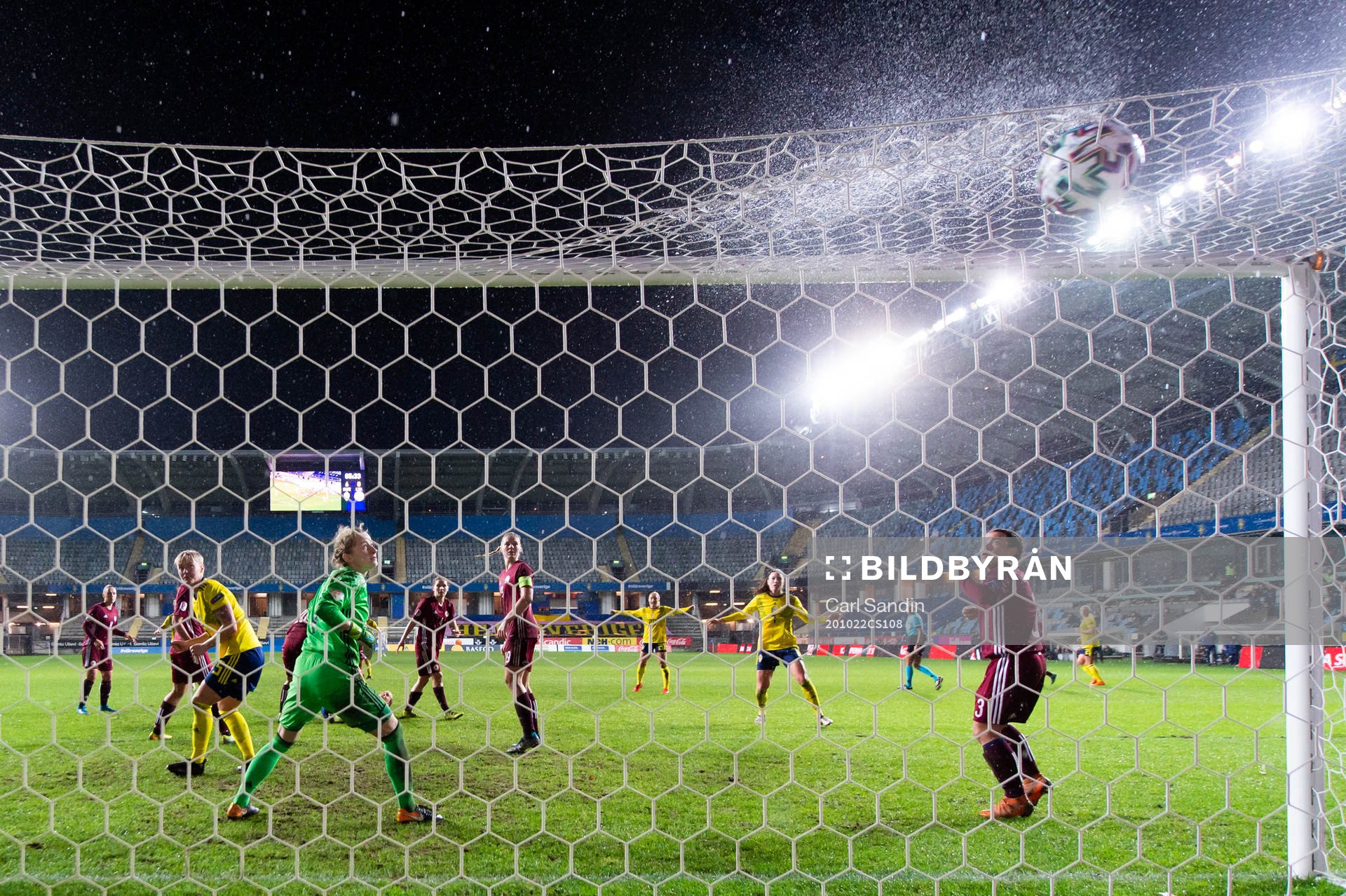 goalkeeper Sofja Nesterova of Latvia watch as the 7-0 goal
