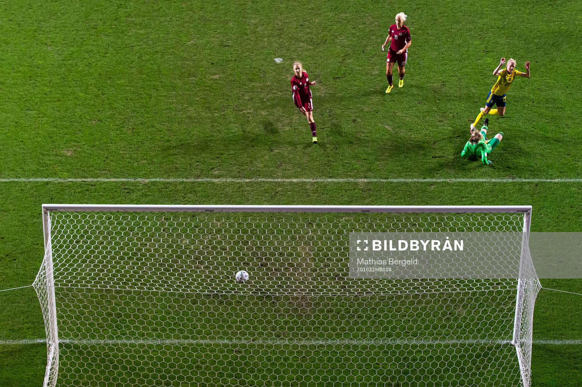 Olivia Schough of Sweden scores 3-0 behind goalkeeper Sofja