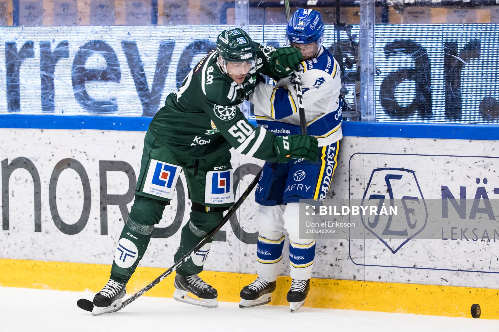 Färjestads Sebastian Erixon och Leksands Oskar Lang