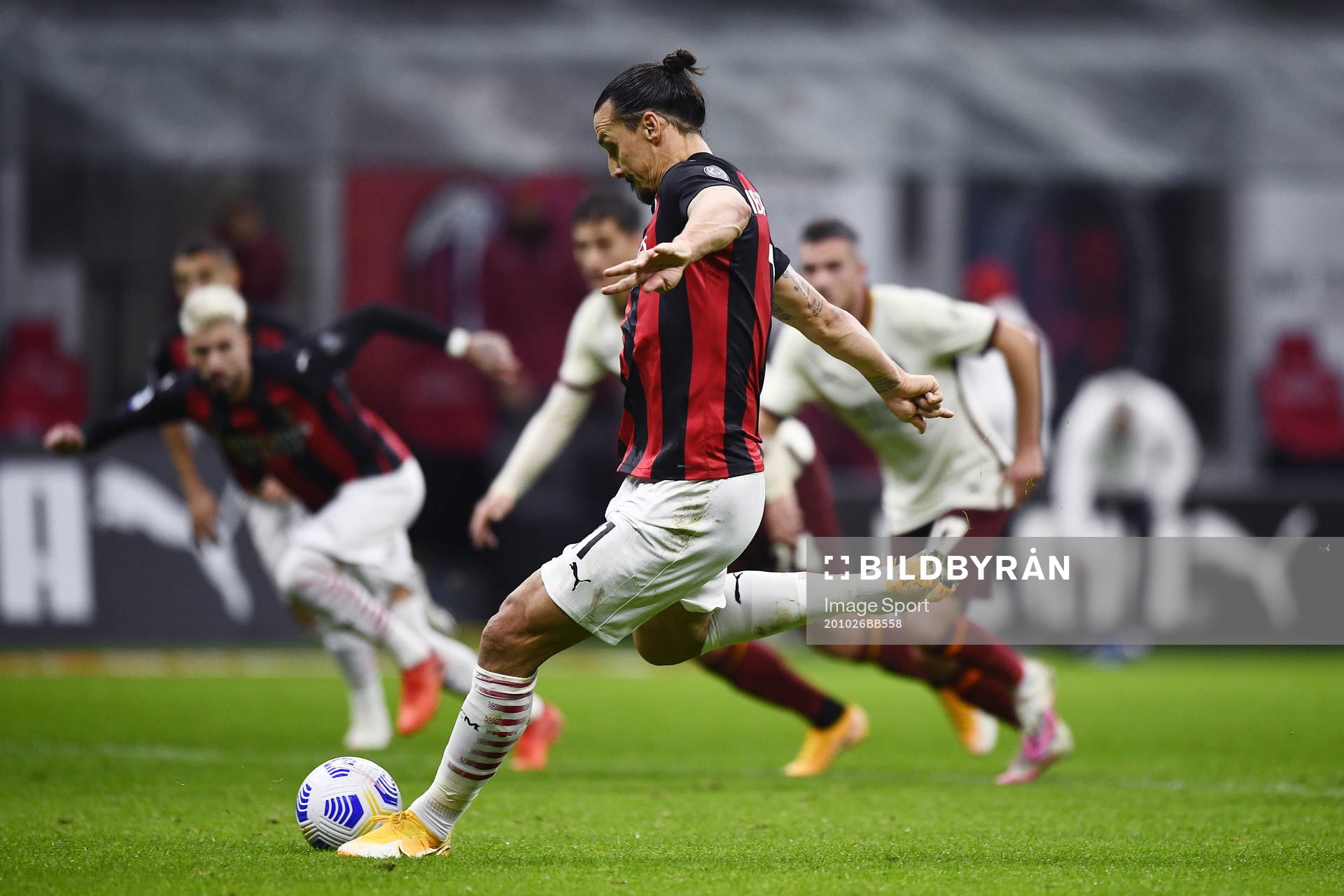 Zlatan Ibrahimovic of Milan scores the 3-2 goal with a