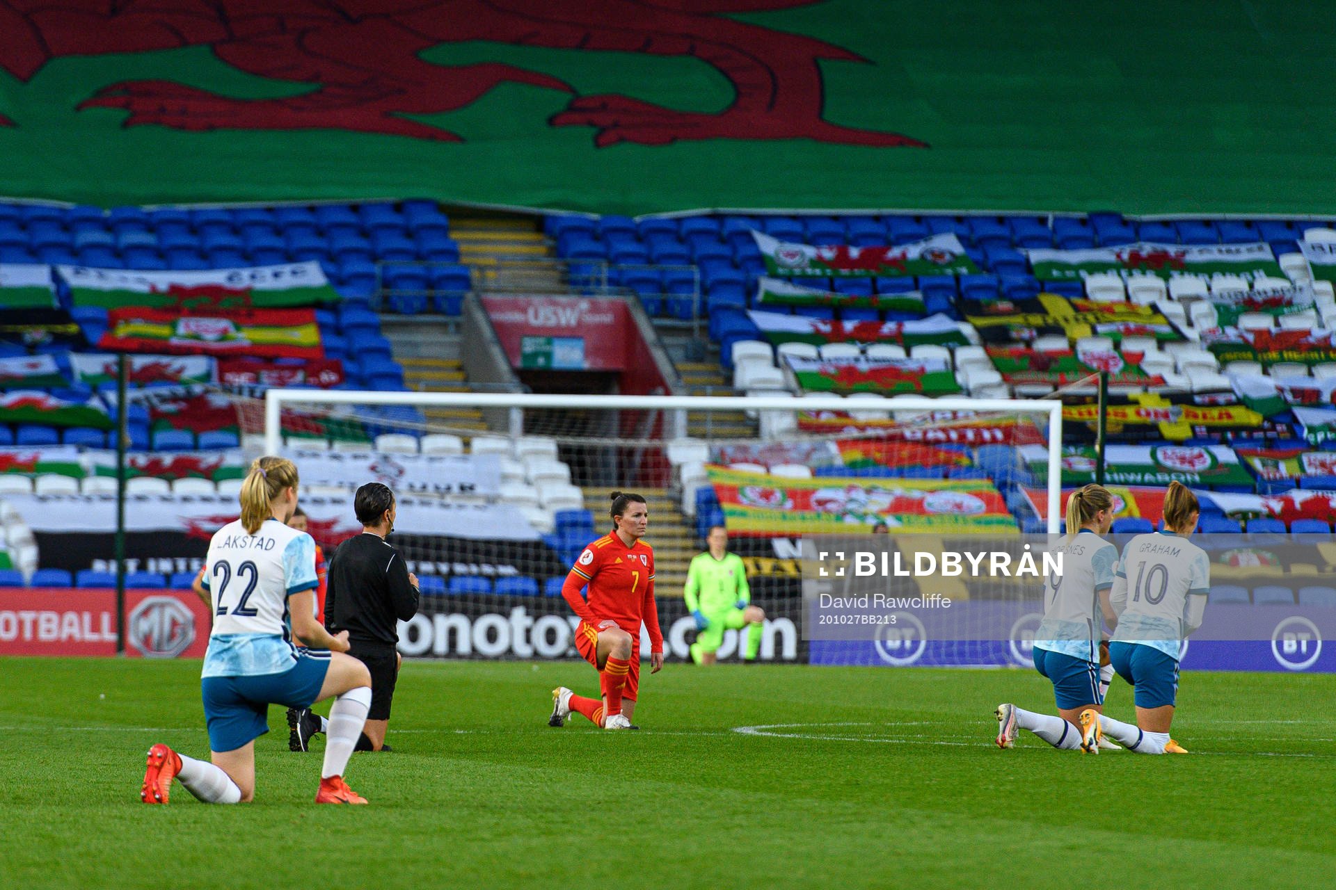 Players of Norway and Wales kneel in support of the Black