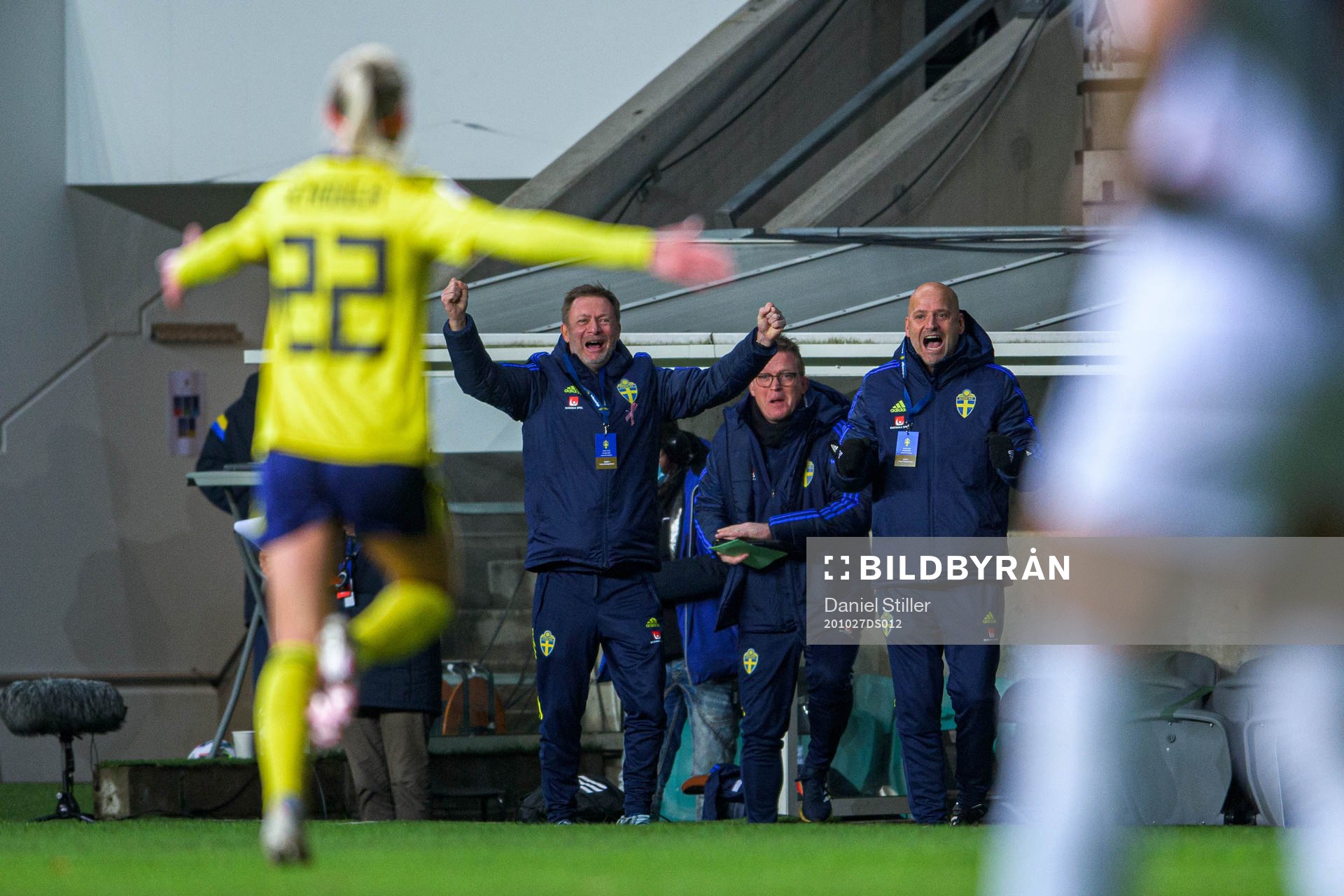Peter Gerhardsson, head coach and Magnus Wikman, assistant coach of Sweden celebrate the 2-0 goal by Olivia Schough during the UEFA Women's Euro Qualifier football match between Sweden and Iceland on October 27, 2020 in Gothenburg.