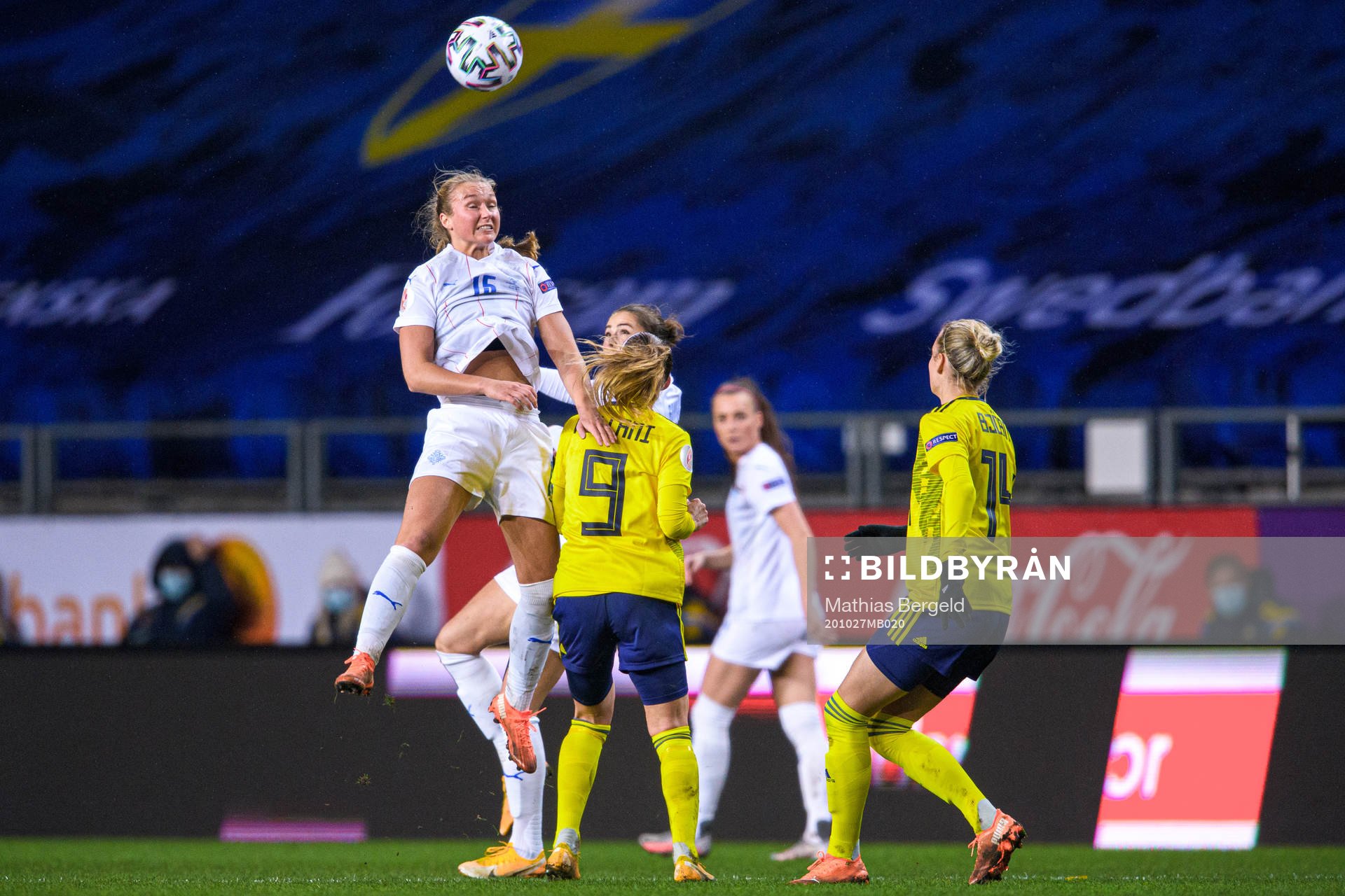 Elín Metta Jensen of Iceland and Kosovare Asllani of Sweden