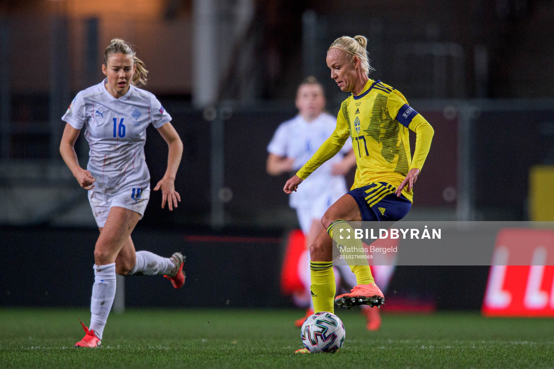 Elín Metta Jensen of Iceland and Caroline Seger of Sweden