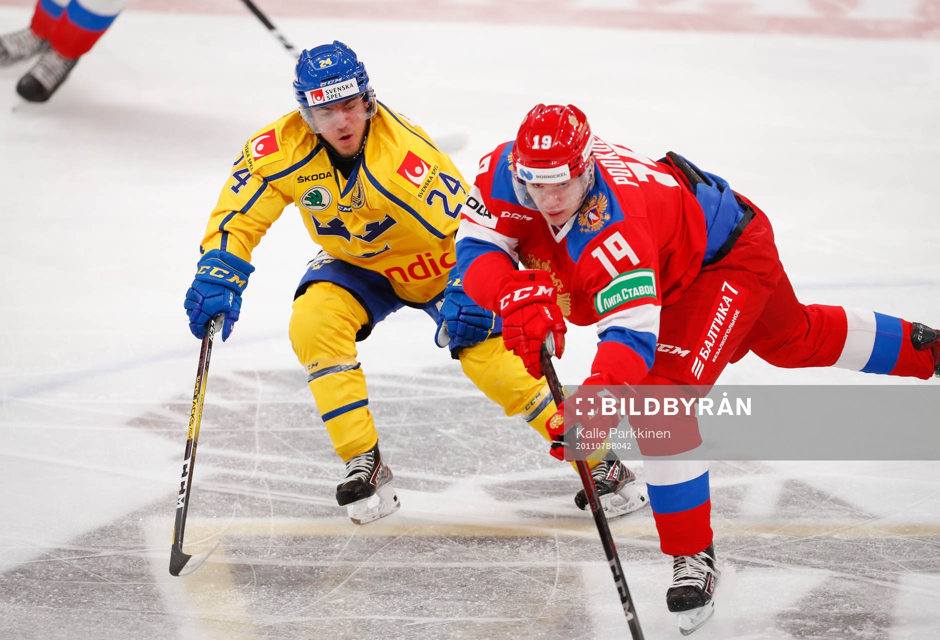 Andreas Wingerli #24, SWE and Vasili Podkolzin #19, RUS