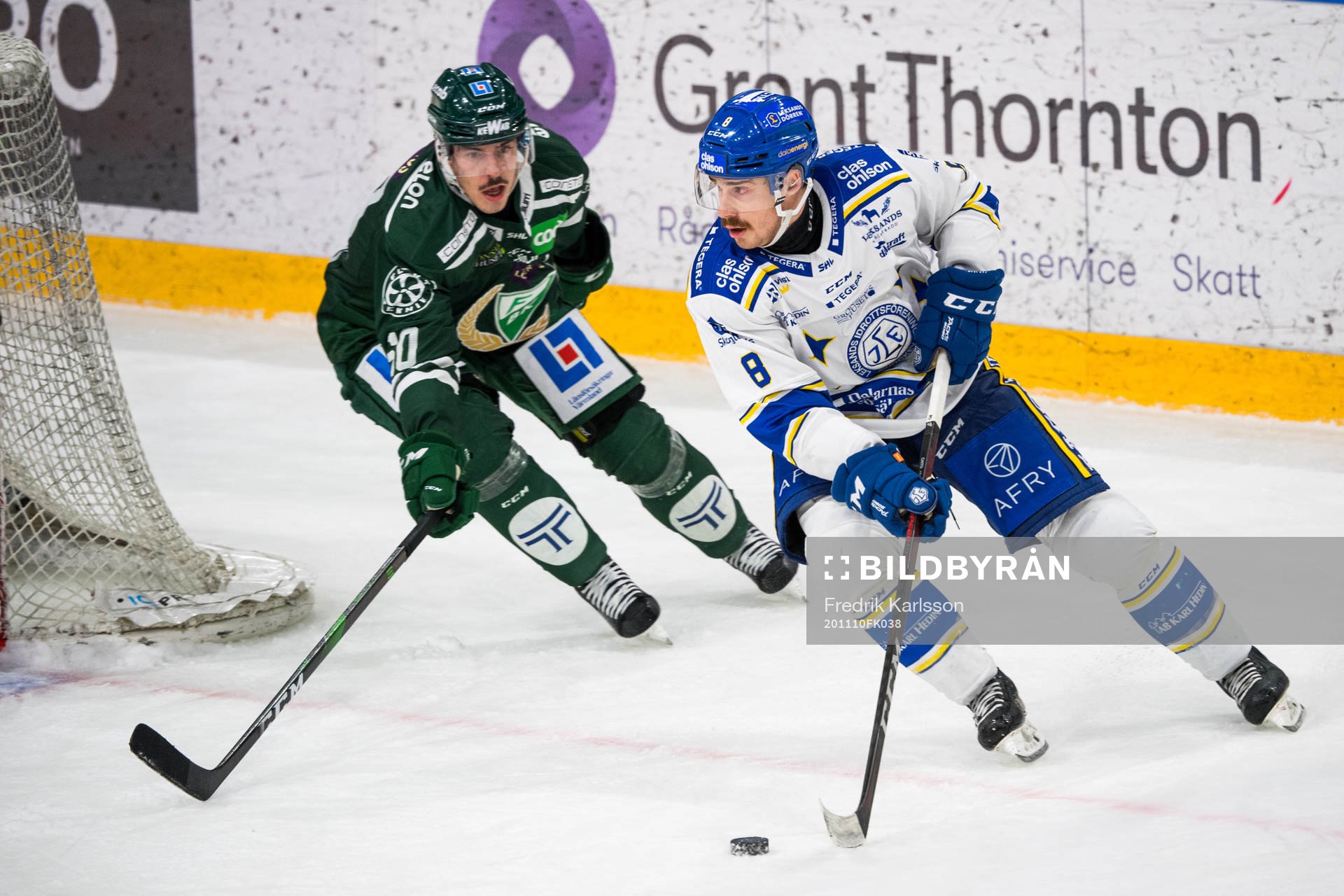 Färjestads Sebastian Erixon och Leksands Matt Caito